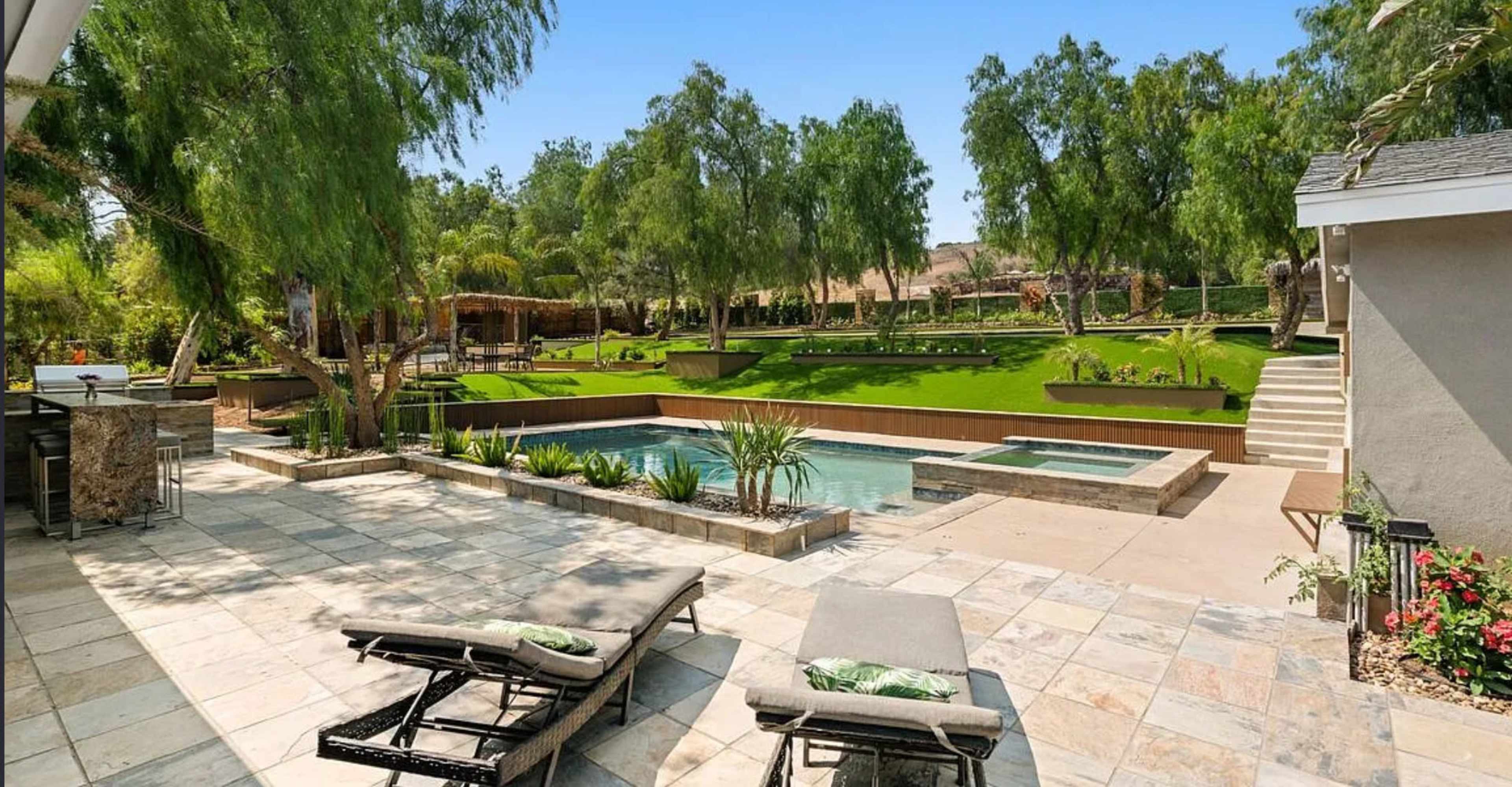 Resort style ranch with a pool, guest house, and main house, several pergolas, covered patio with the TV and surrounding sound system Image in Shadow Hills, shadow hills, CA