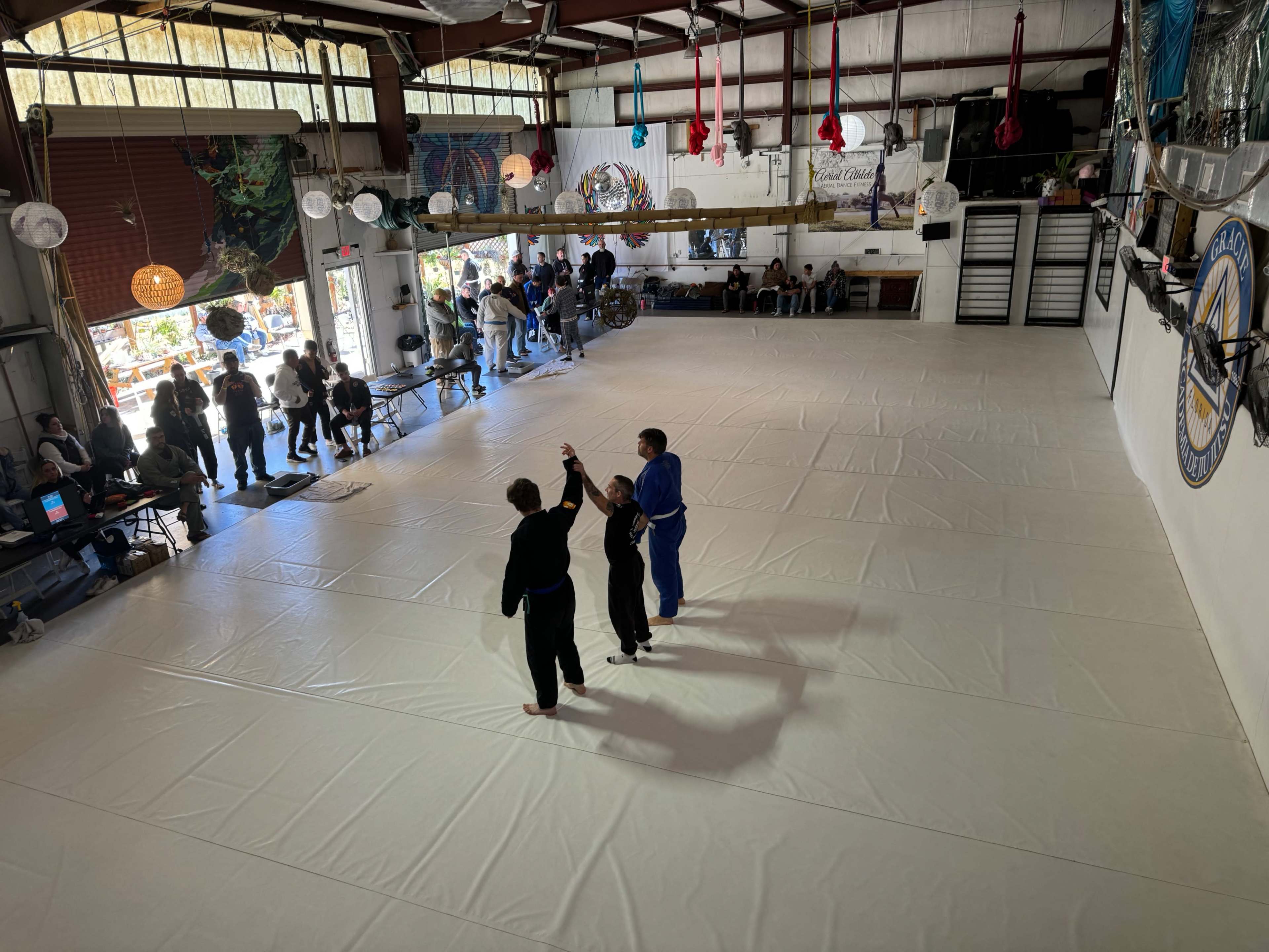 Large seamless white matted area  and  10 ft of concrete area adjacent to it. Image in , St. Augustine, FL