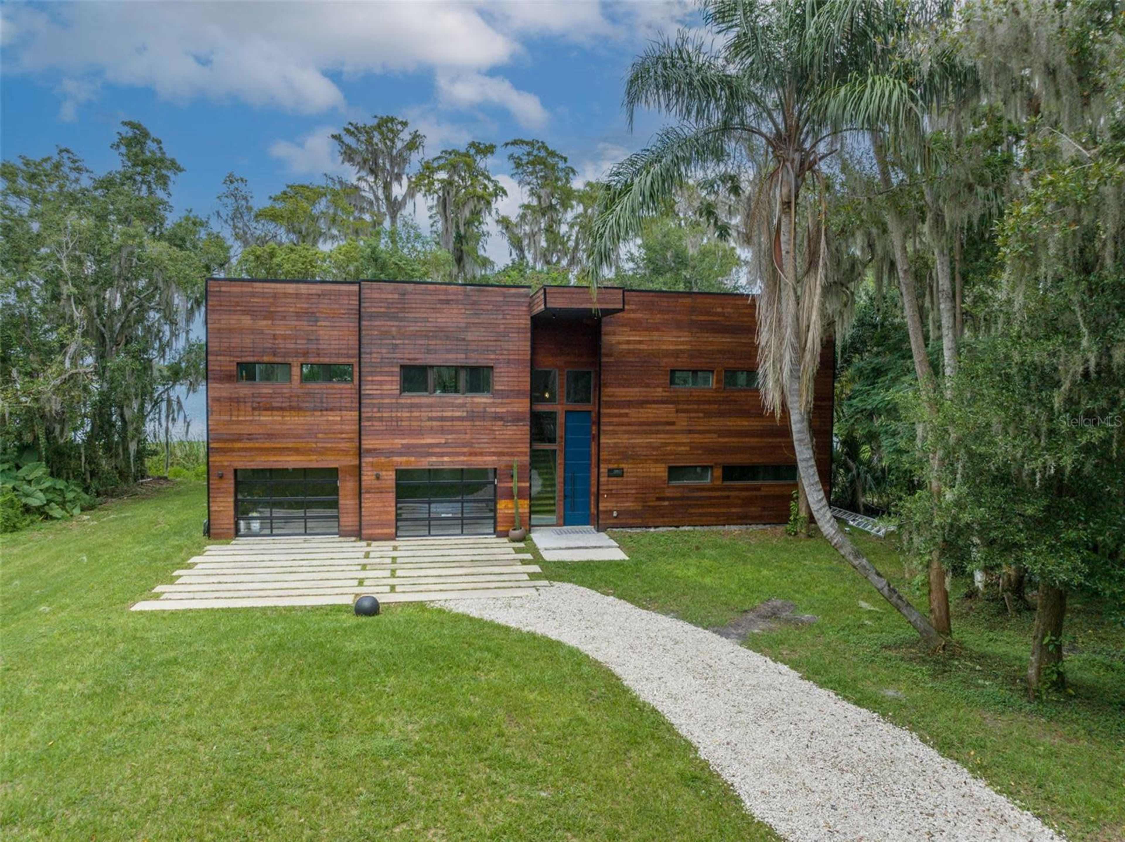 Lakefront Luxury Home with Private Gate & Expansive Grounds Image in Southeast Orlando, Orlando, FL