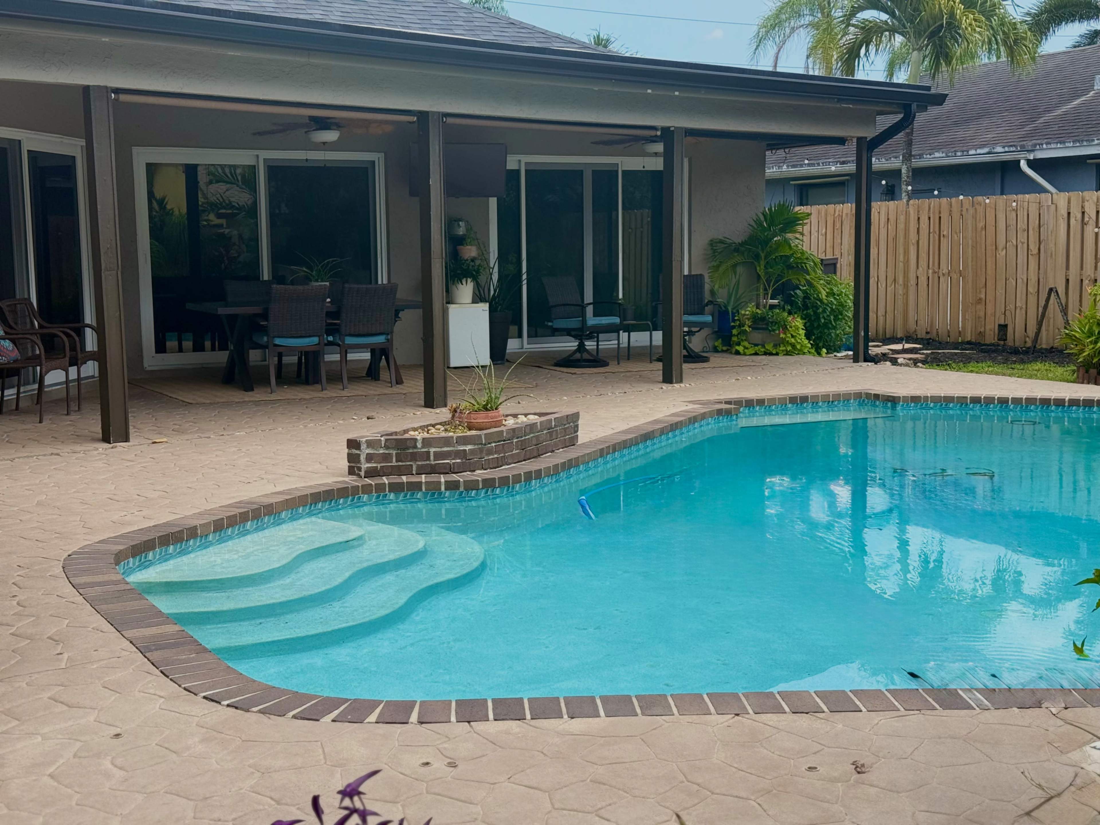 Private Poolside Oasis with Covered Patio, Fire Pit & Games Image in Plantation, Plantation, FL