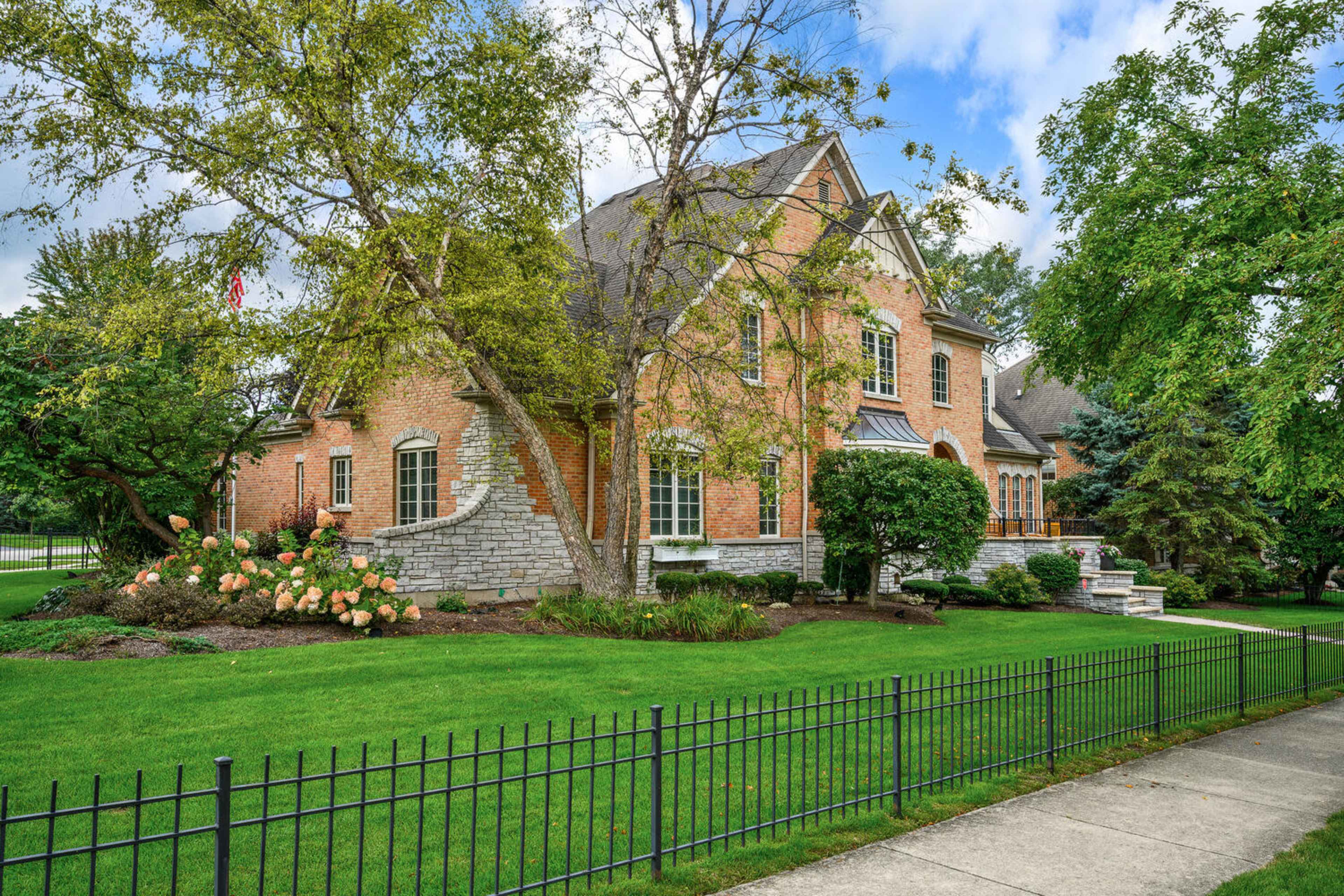 Suburban Refined Brick Estate Blending Classic Charm & Modern Comfort Image in York Township, Elmhurst, IL
