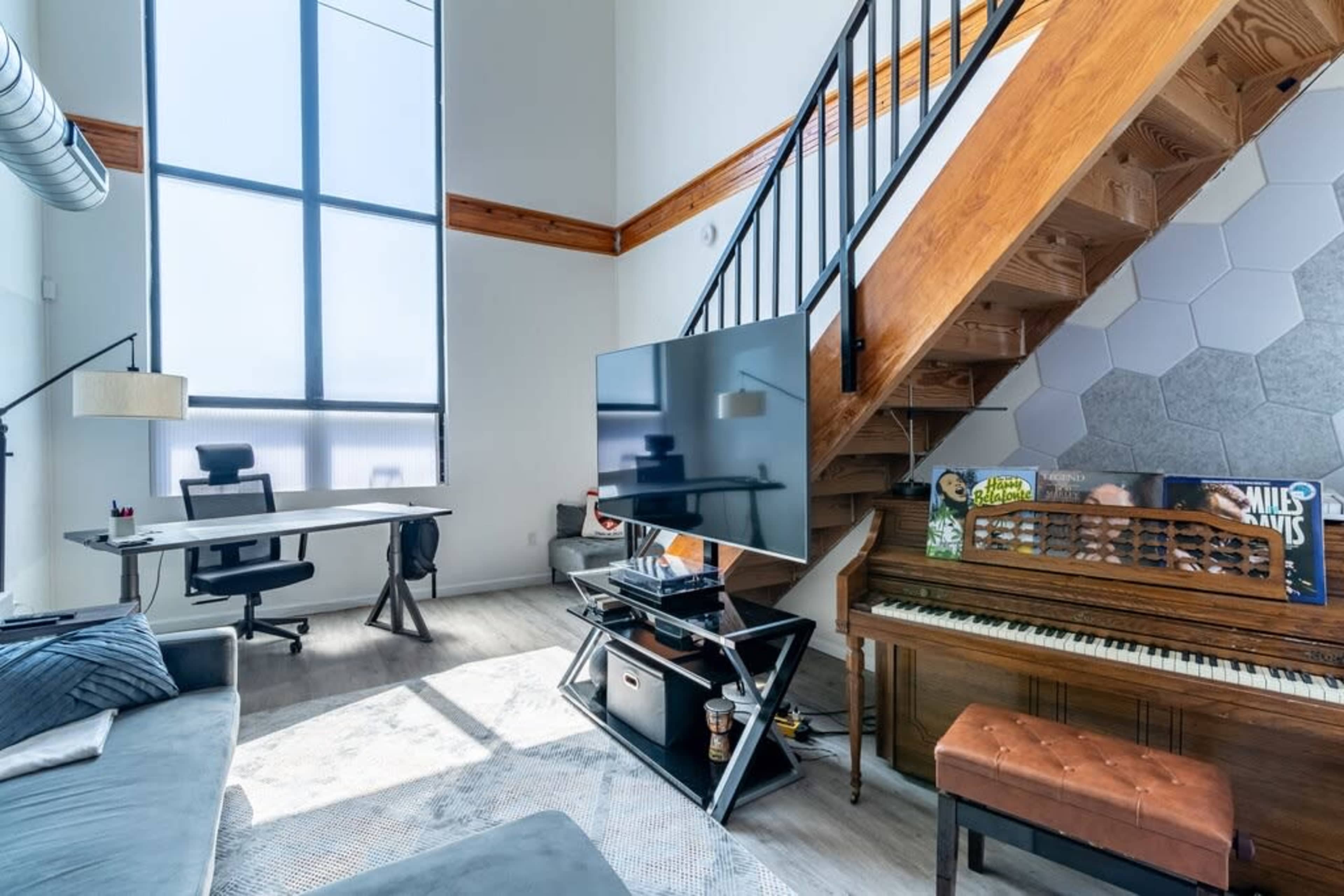 Urban Loft Oasis with Beautiful Natural Light, Piano, & Rooftop with Skyline Views. Image in East Passyunk Crossing, Philadelphia, PA