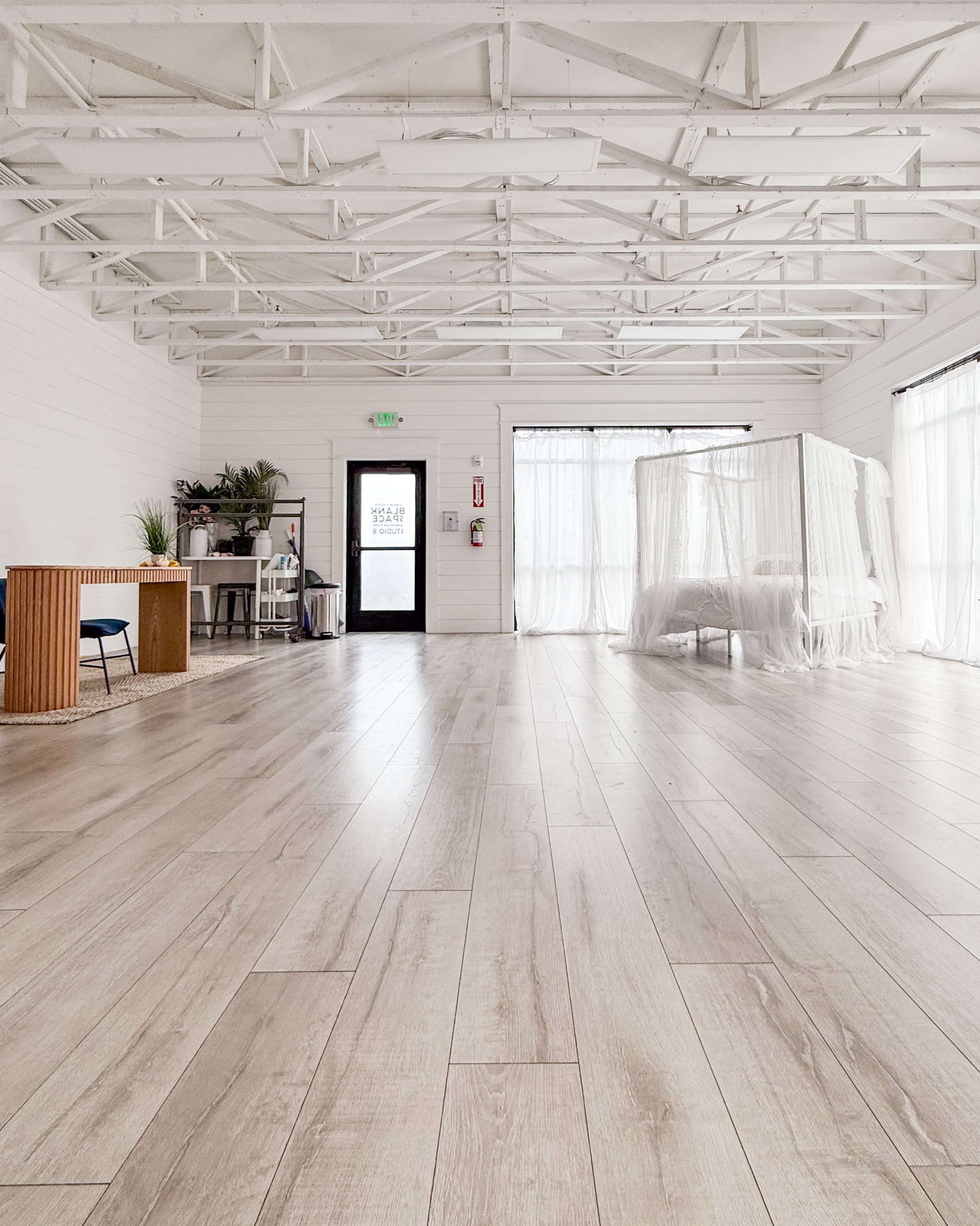 Roomy Photo Studio with Shiplap, White Brick, and Moveable Backdrops Image in American Fork, American Fork, UT