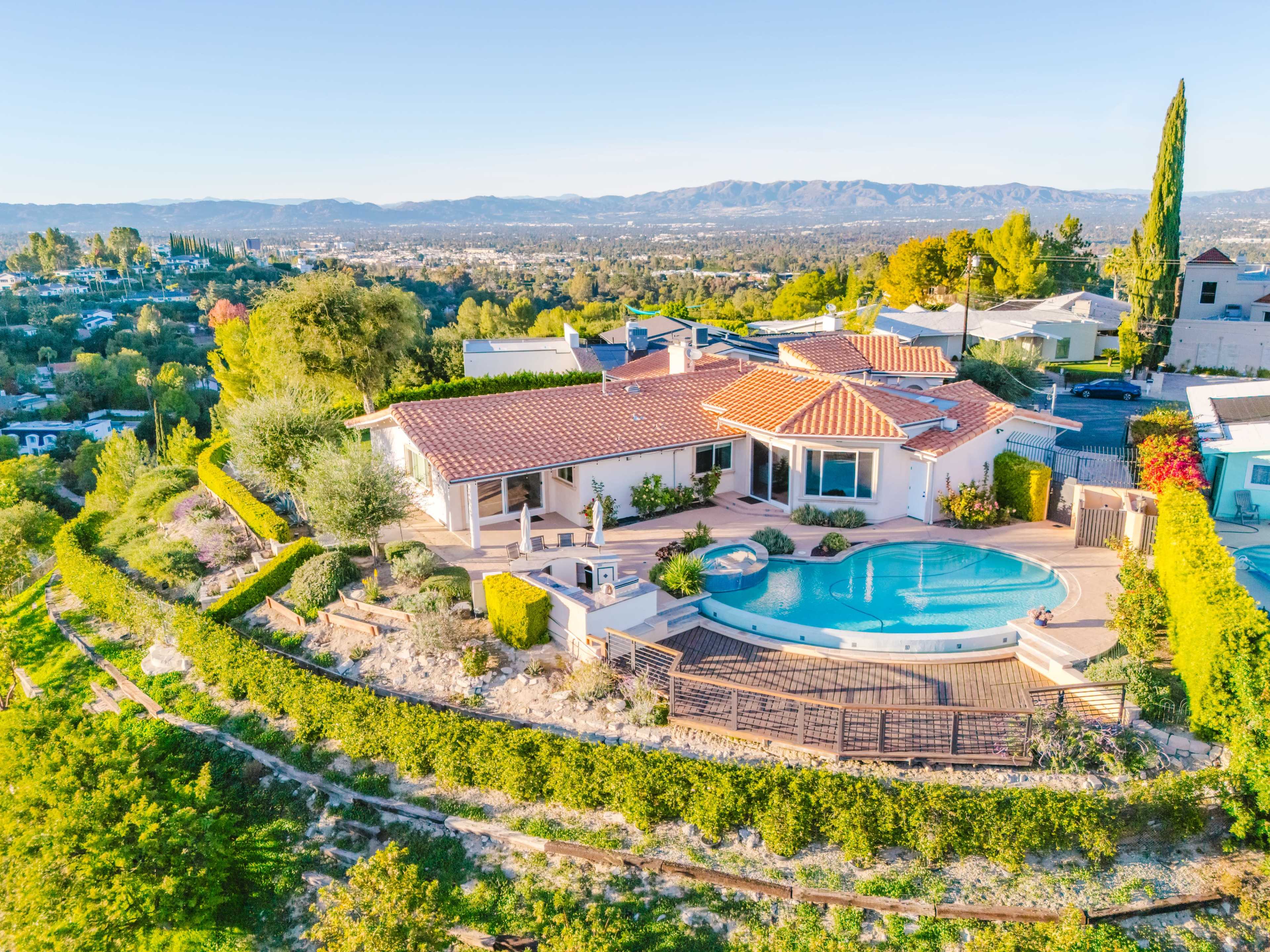 CINEMATIC VILLA ESTATE WITH POOL & PANORAMIC VIEWS Image in Encino, Los Angeles, CA