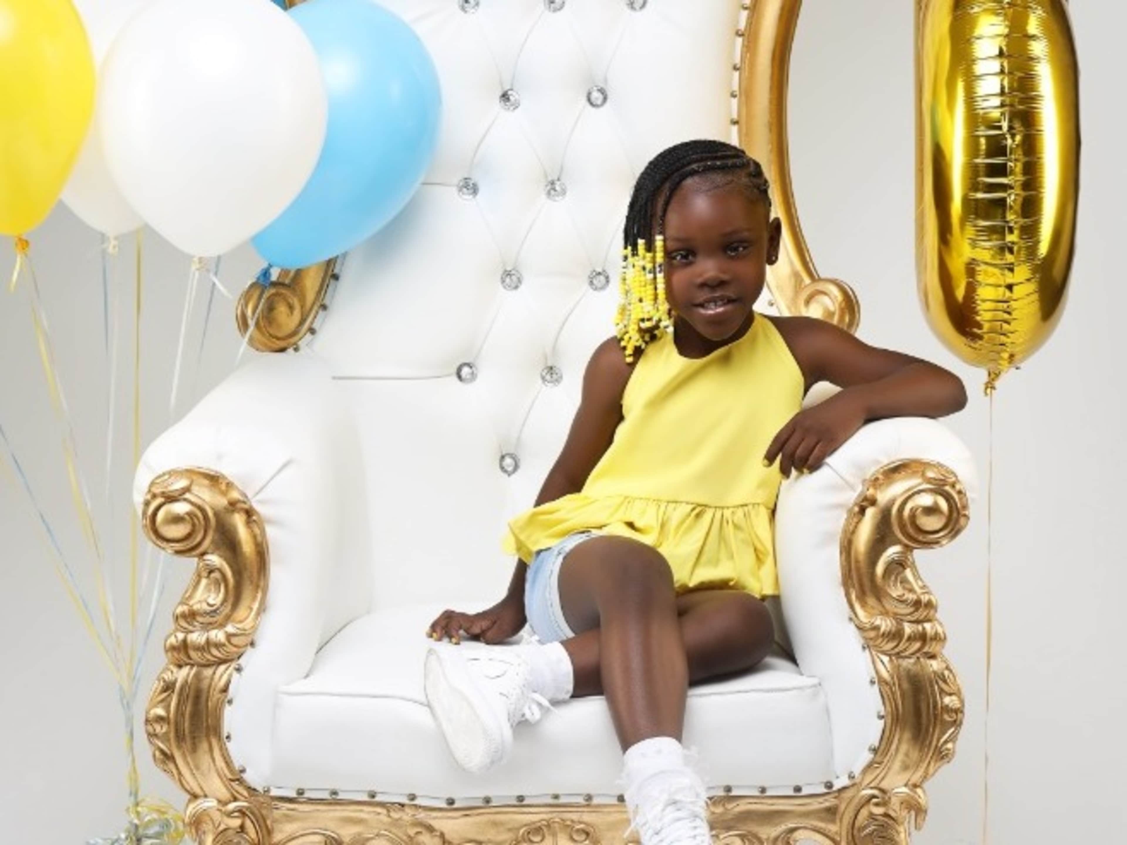 white and gold throne chair