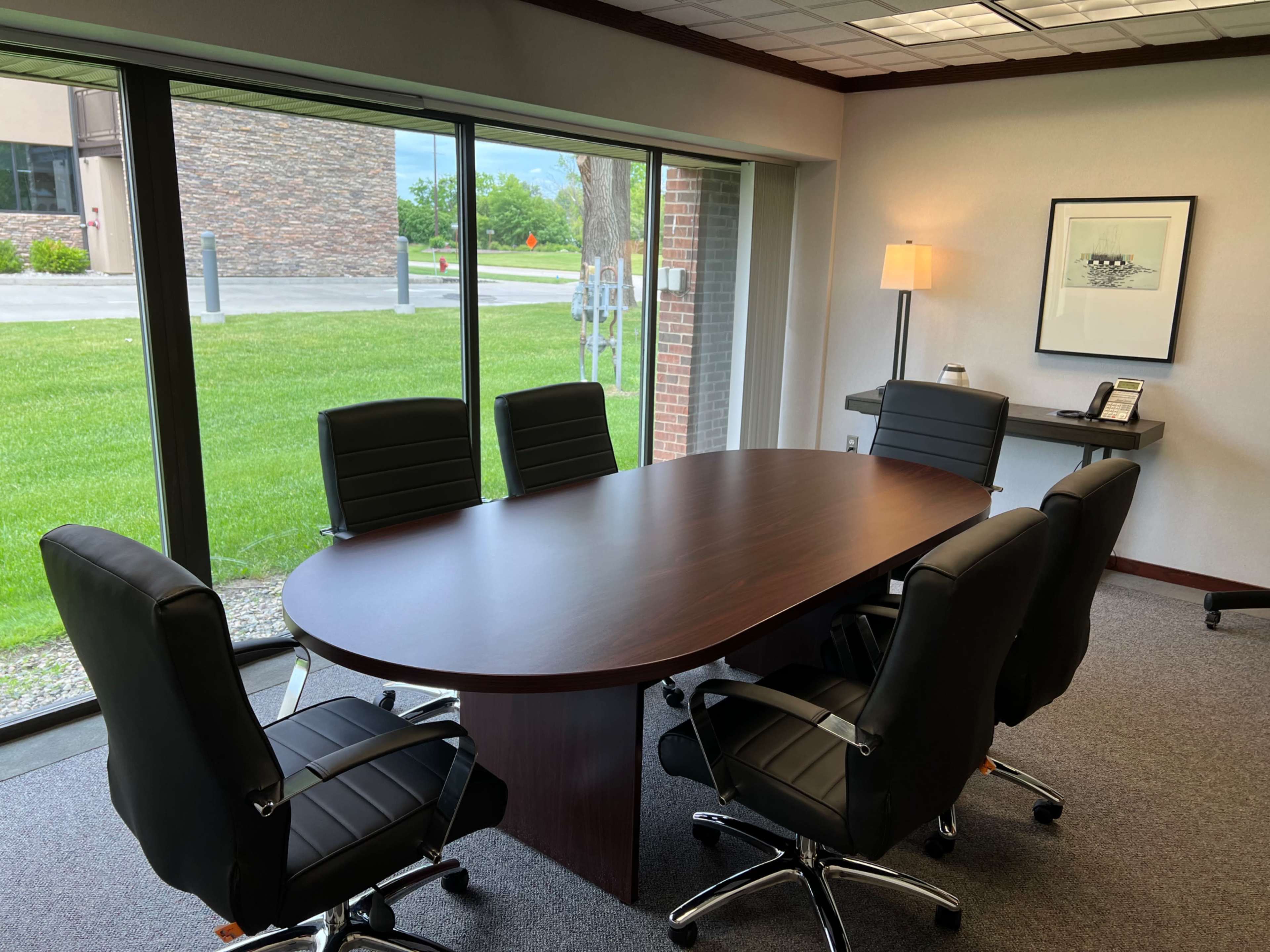 Spacious Meeting Room for 6 w/ TV & Large Windows Image in , Troy, MI