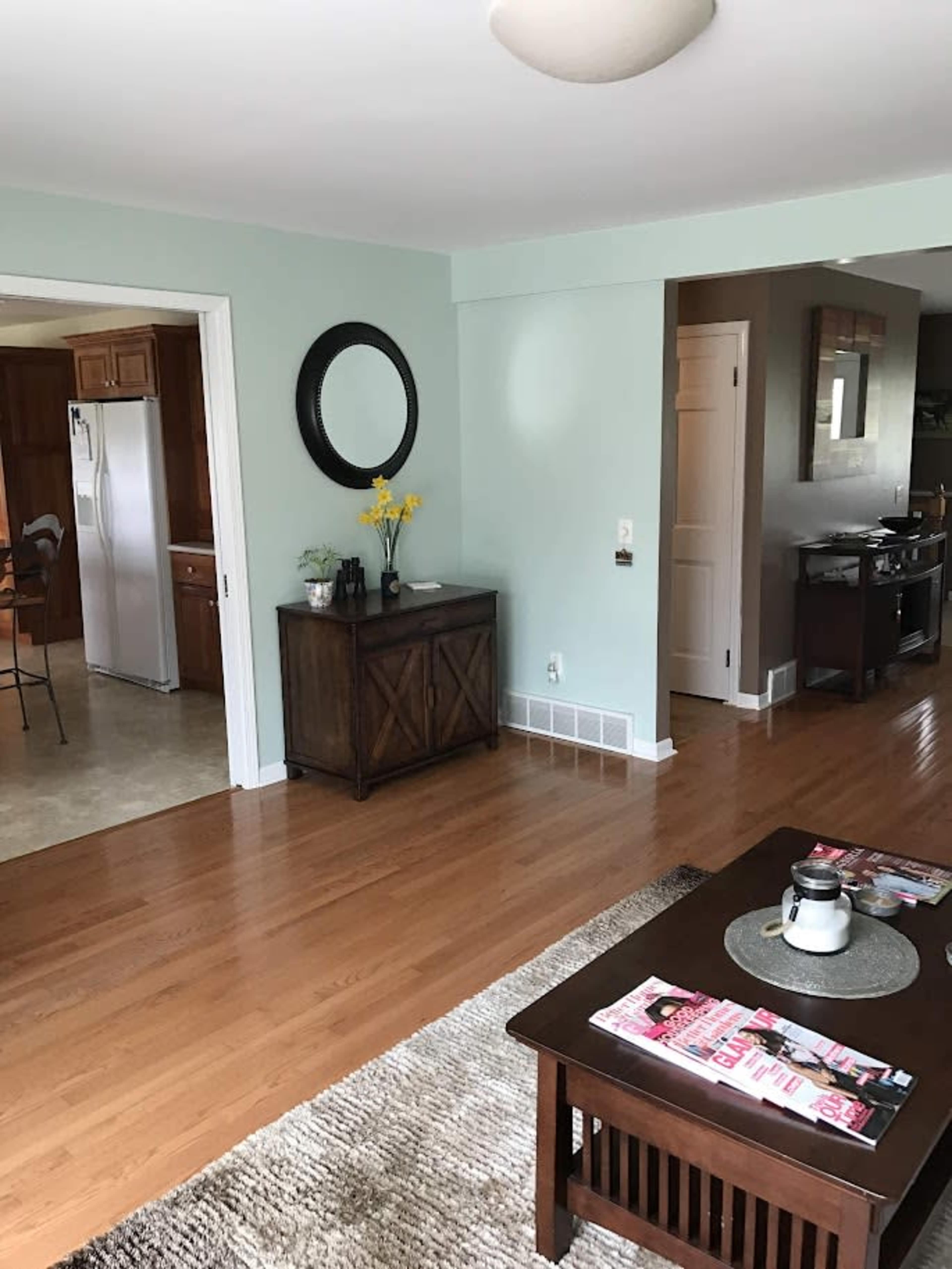 Country feel, minutes to town!   Horses surrounding the ranch, visible from all the windows in this spacious Horse Ranch home.   Outside spaces including barn, tiny home, picnic tables available to guests. Image in Ada Township, Ada, MI