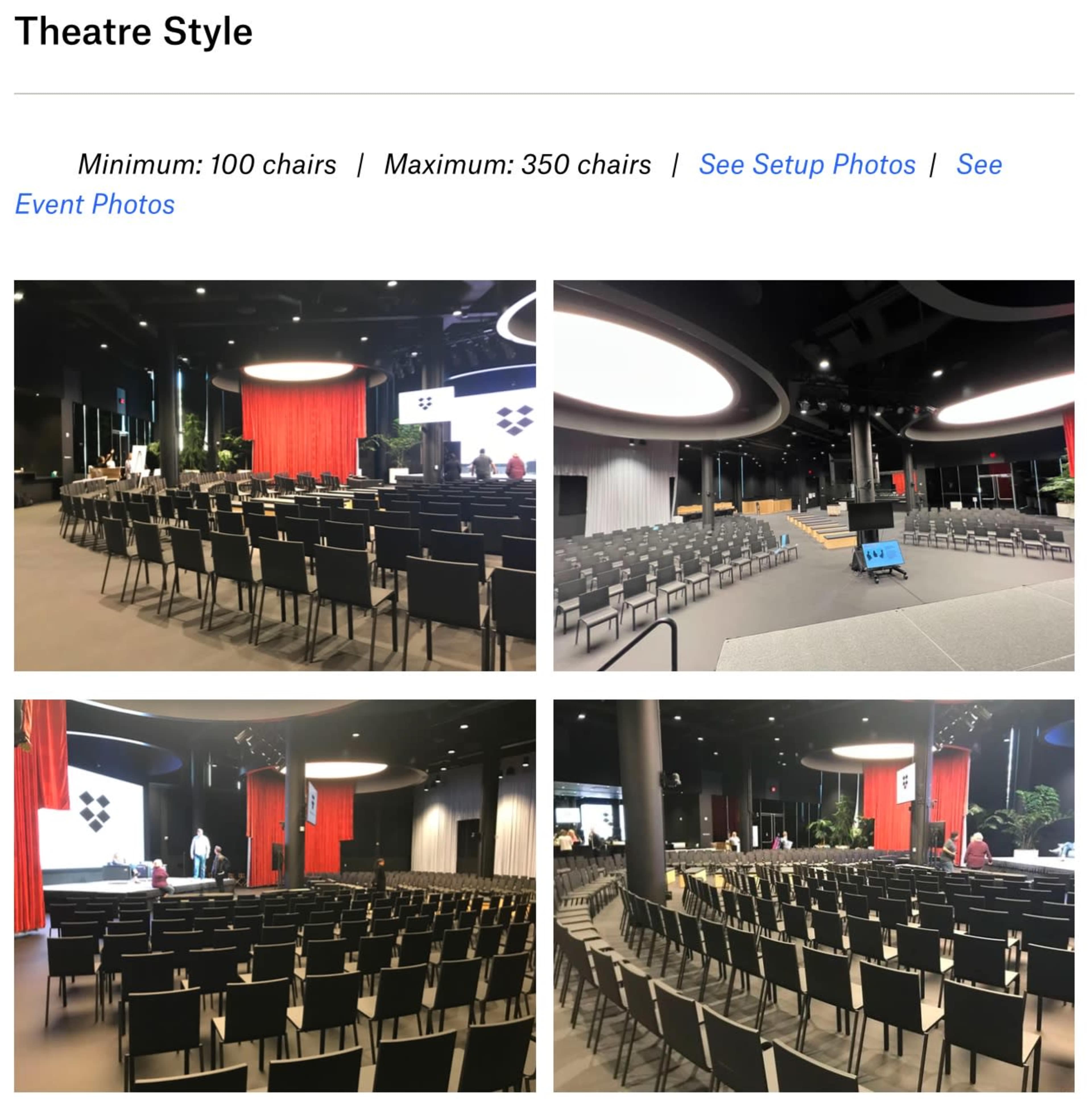 A conference space set up for a theatre-style seating arrangement, featuring rows of chairs with red and neutral drapes in the background.