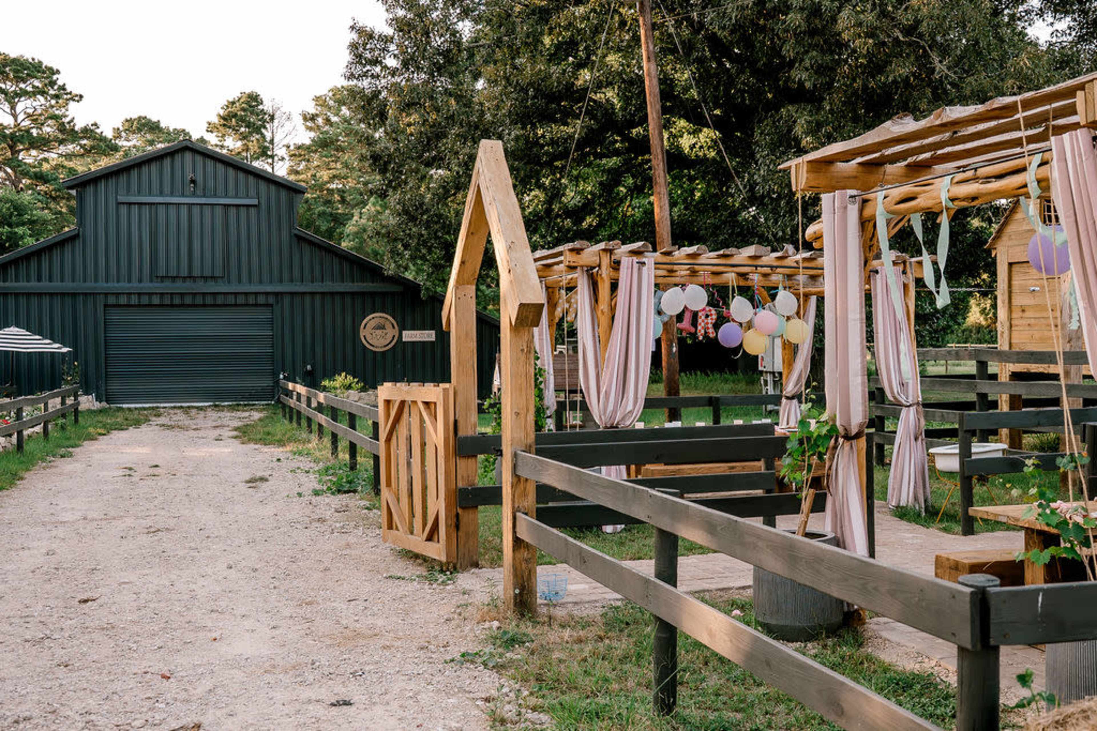 Romantic Farm Garden Pergola with Kids’ Playground & Petting Zoo Image in , Conroe, TX