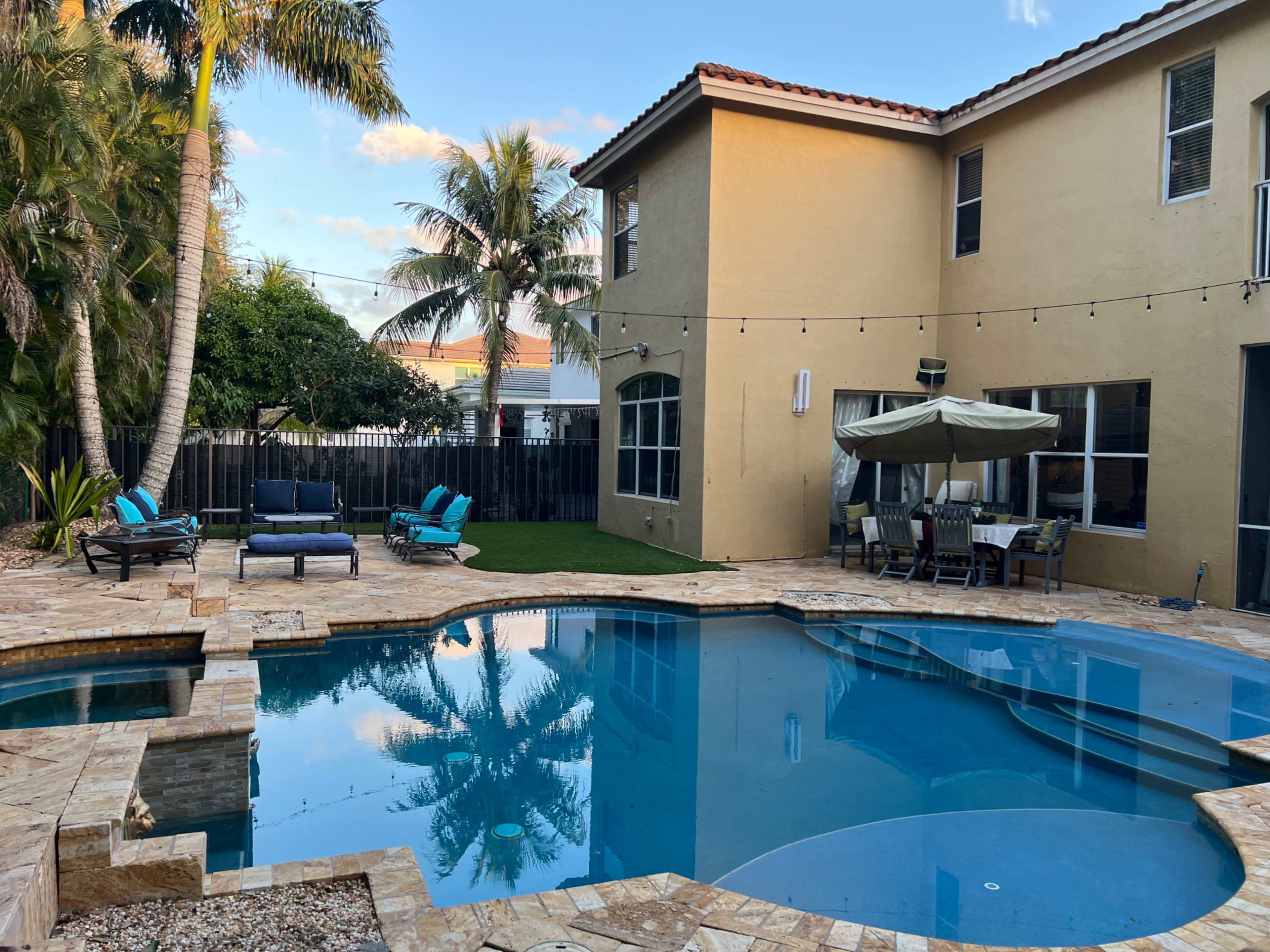 Spacious Backyard and Lanai With Pool Image in , Lake Worth, FL