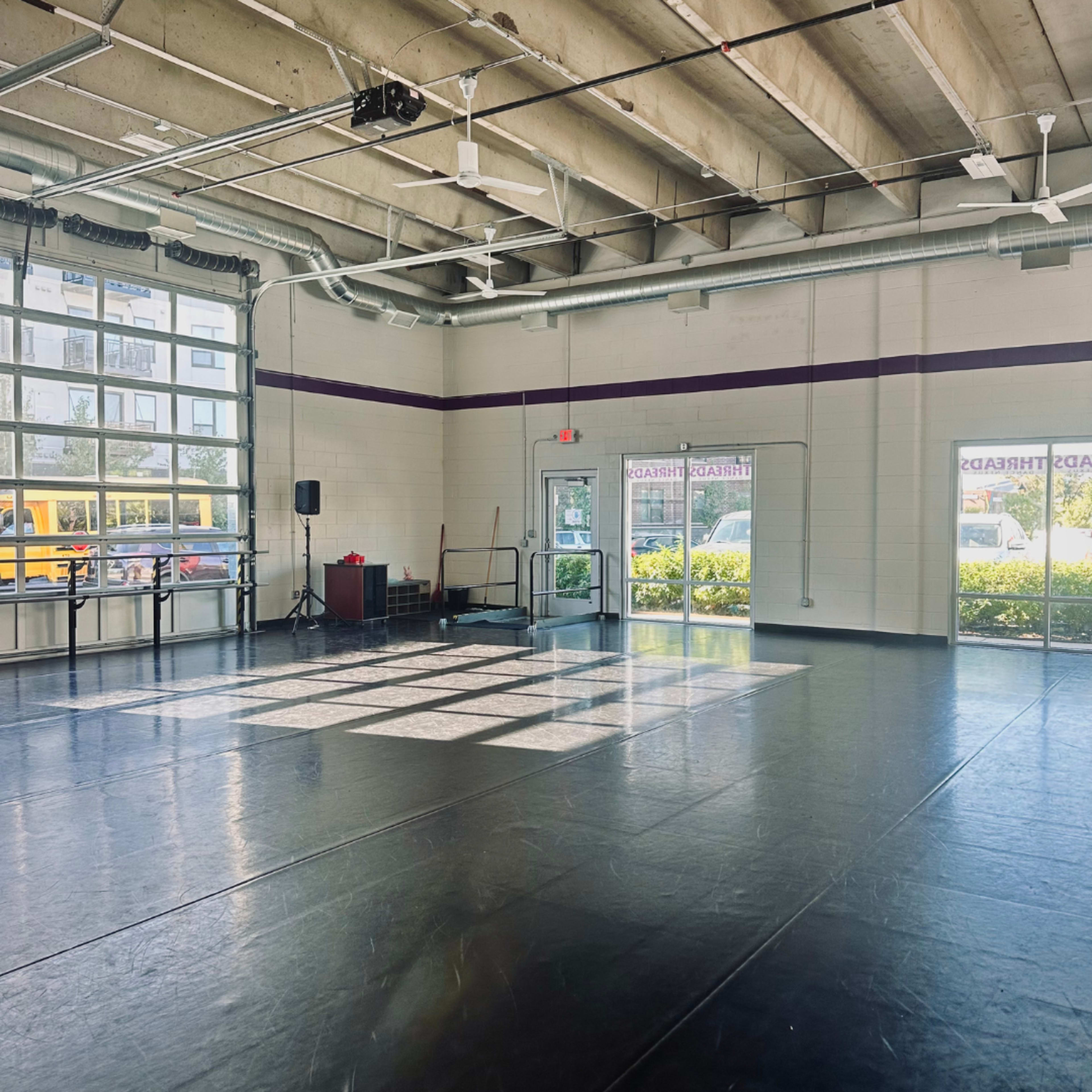 Industrial Dance Studio with Floor to Ceiling Windows Image in Seward, Minneapolis, MN