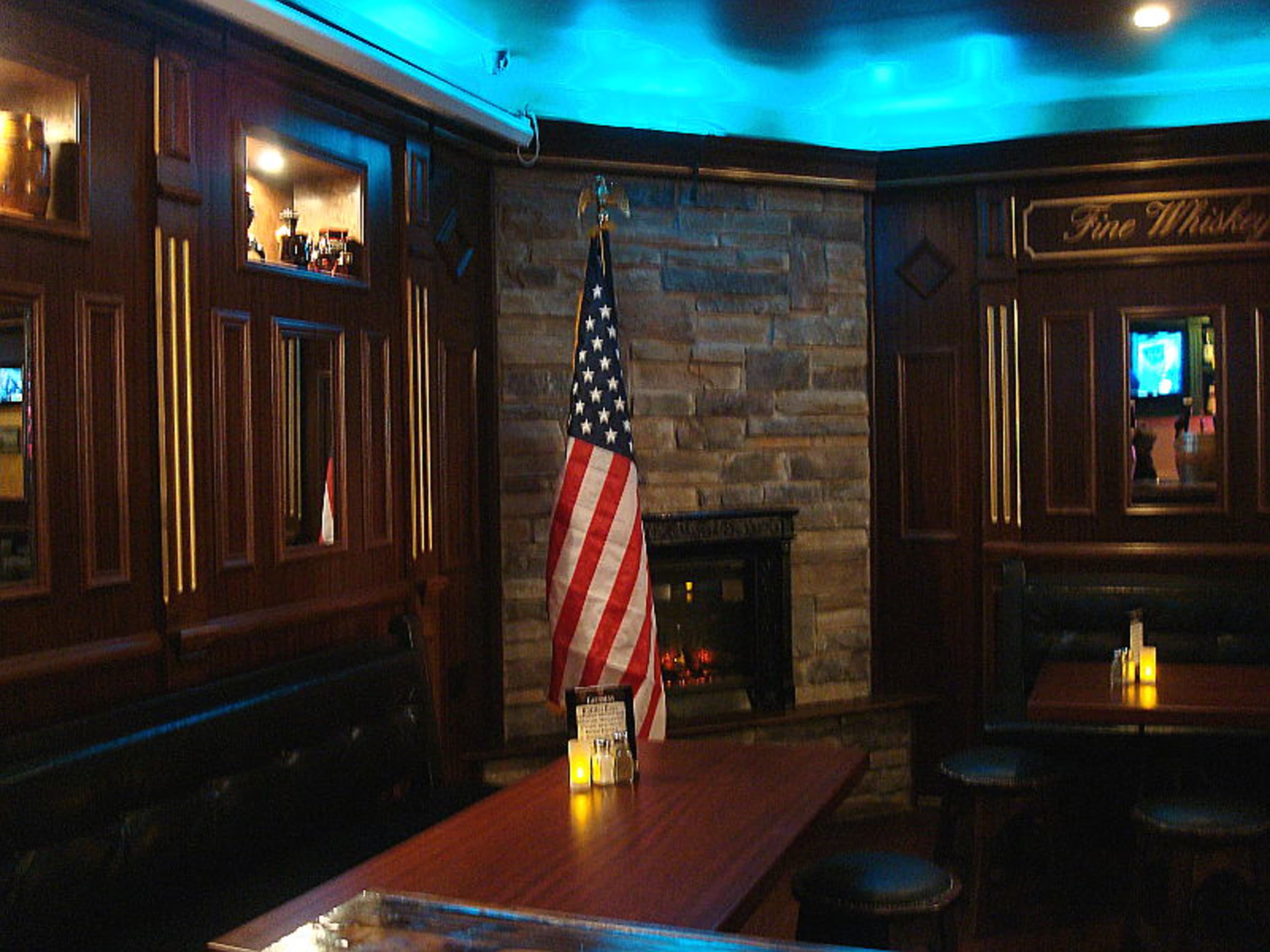 Tap Room + Fireplace Image in Midtown, New York, NY