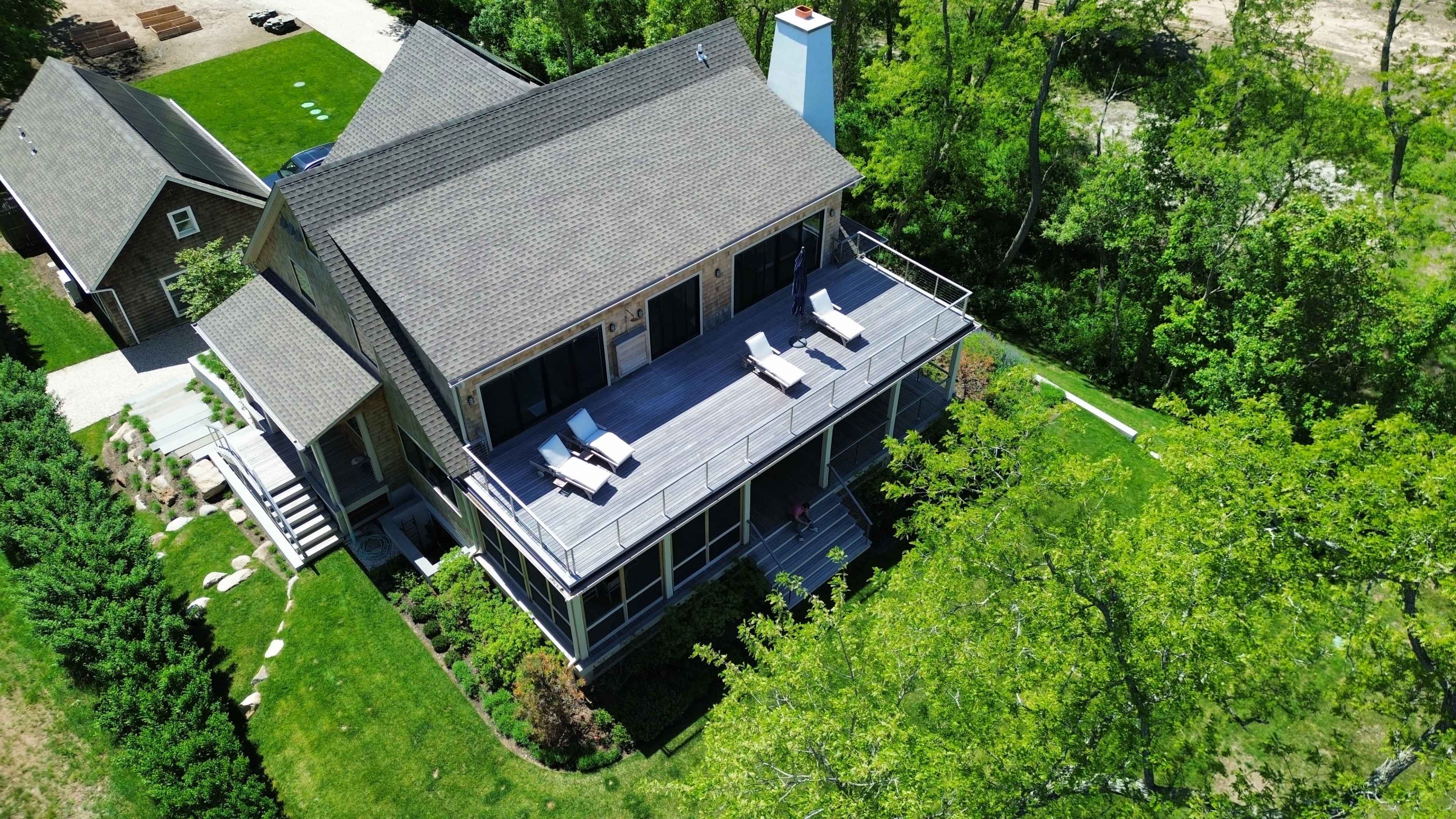 Gorgeous new home on the beach With STUNNING views of the LI Sound and vivid colorful sunsets Image in North Fork, Peconic, NY
