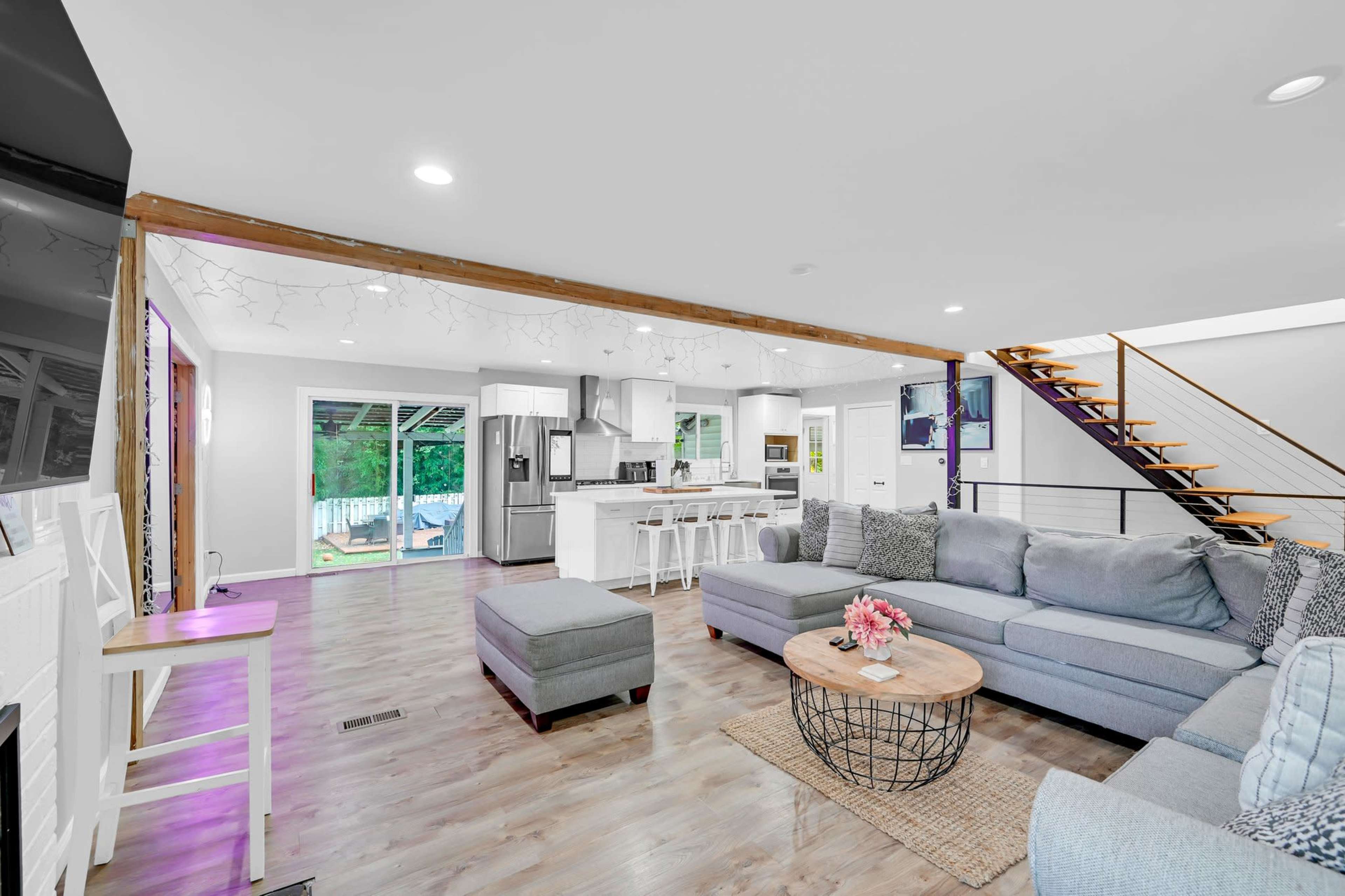 Modern Open Concept Entire single family home with basketball court and full deck in the back yard. Small creek runs as well on side of property. Image in Englewood, Englewood, NJ