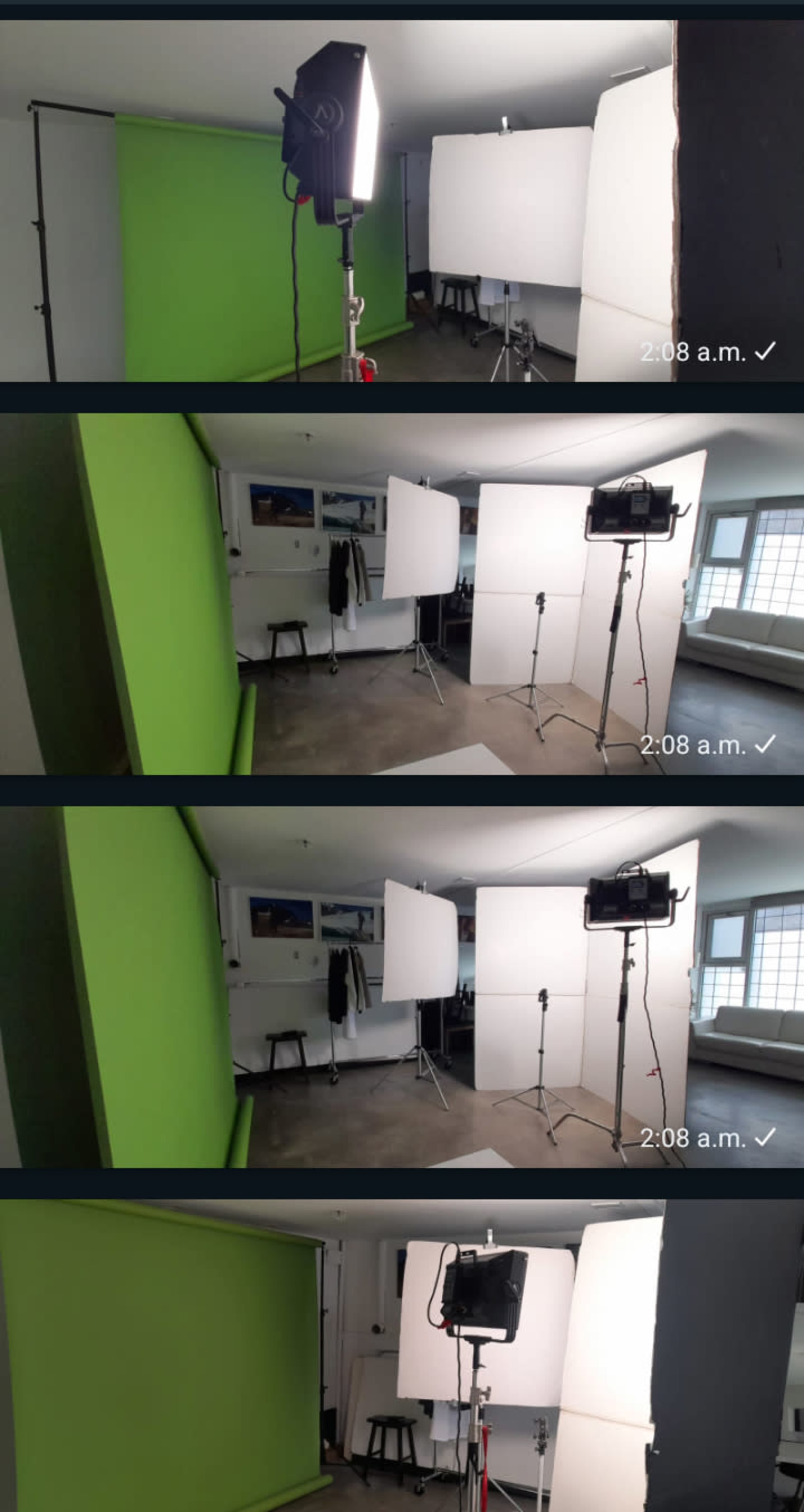 A photography studio with various backdrops, lighting equipment, and light stands set up in a well-lit room.