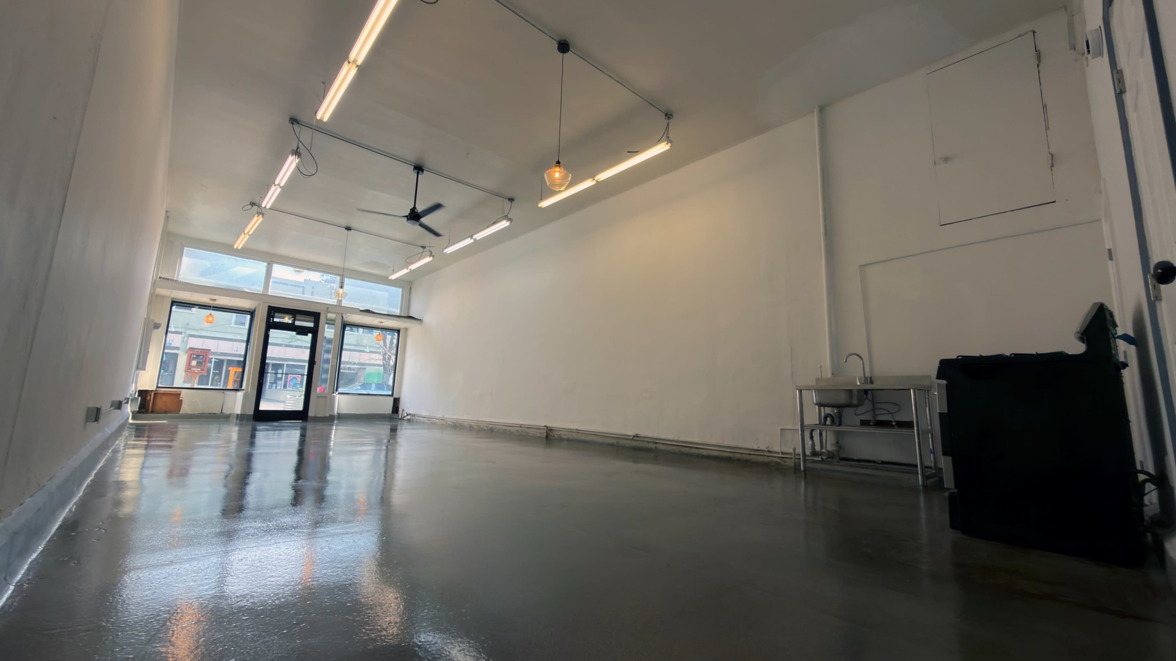 Bright Minimal Storefront Event Space with Polished Concrete Floors Image in , Oakland, CA