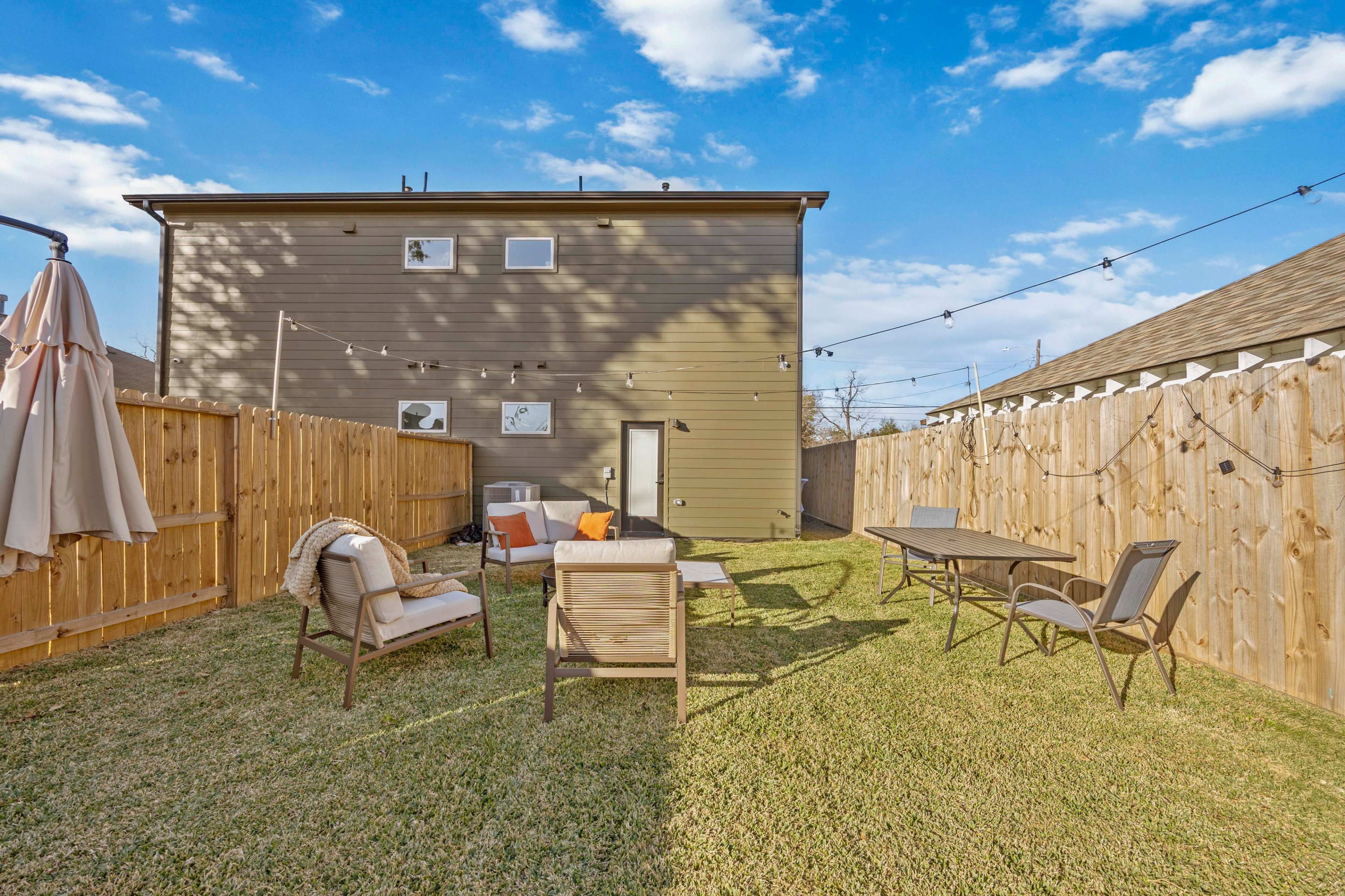Fully Fenced Urban Upscale Backyard Romantic String light Space Image in Greater Fifth Ward, Houston, TX