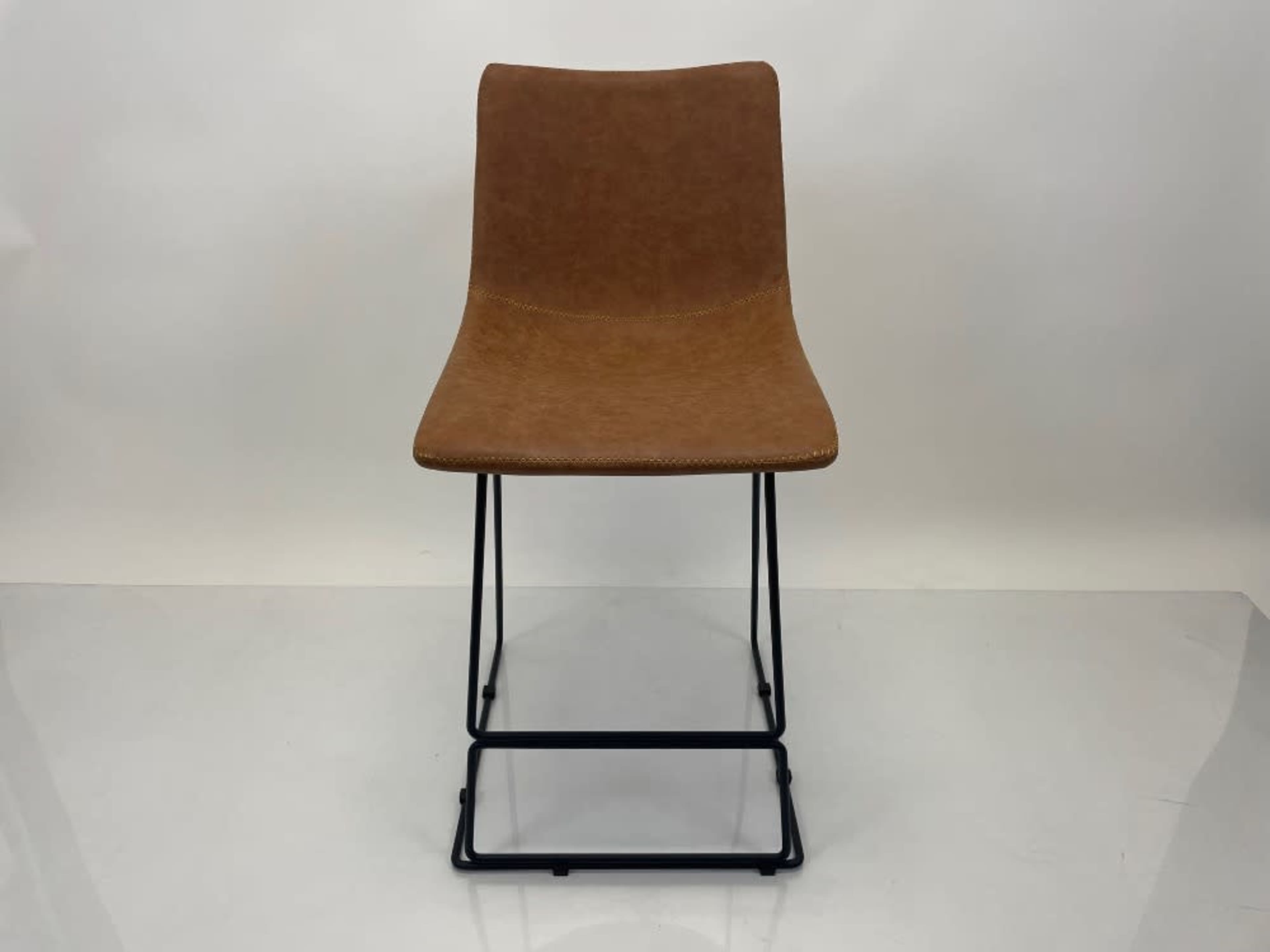 Brown leather stool