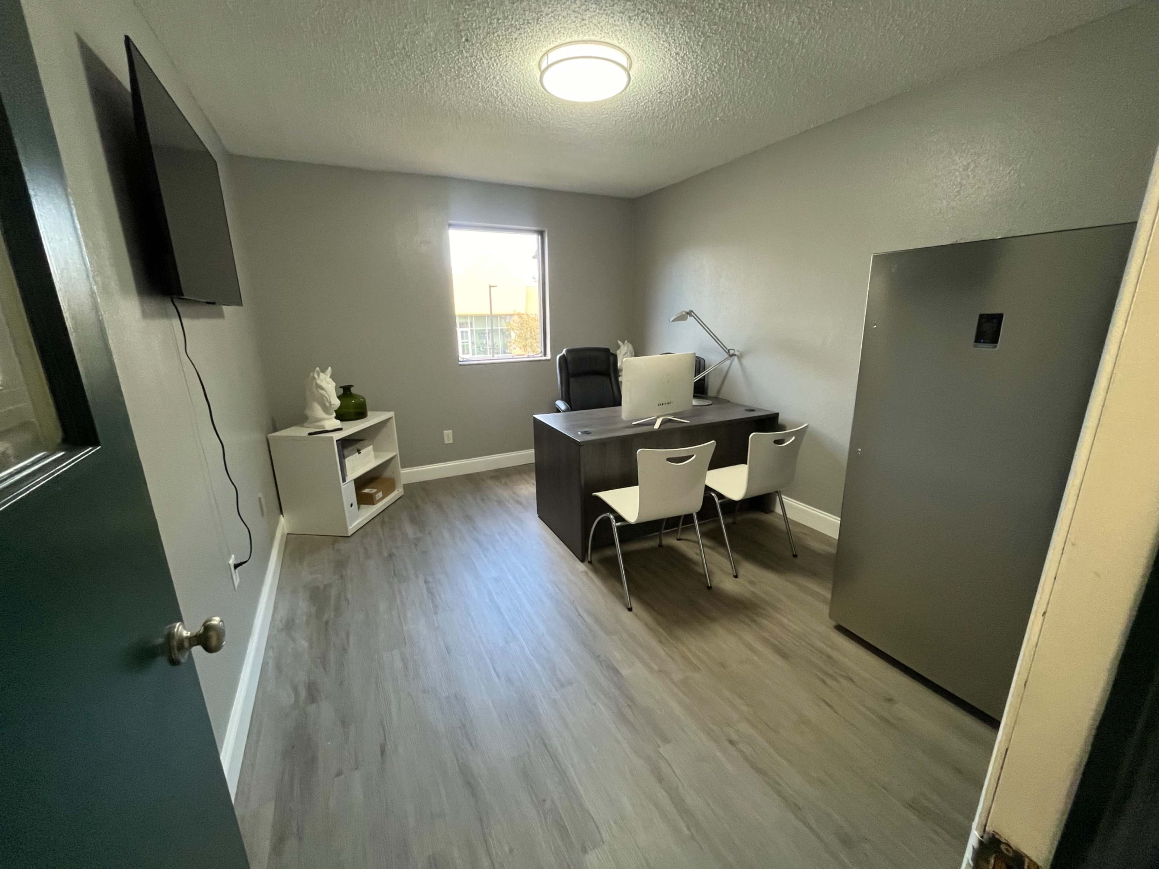 Modern office space with refrigerator/freezer Printer and couch Image in Temple Terrace, Temple Terrace, FL