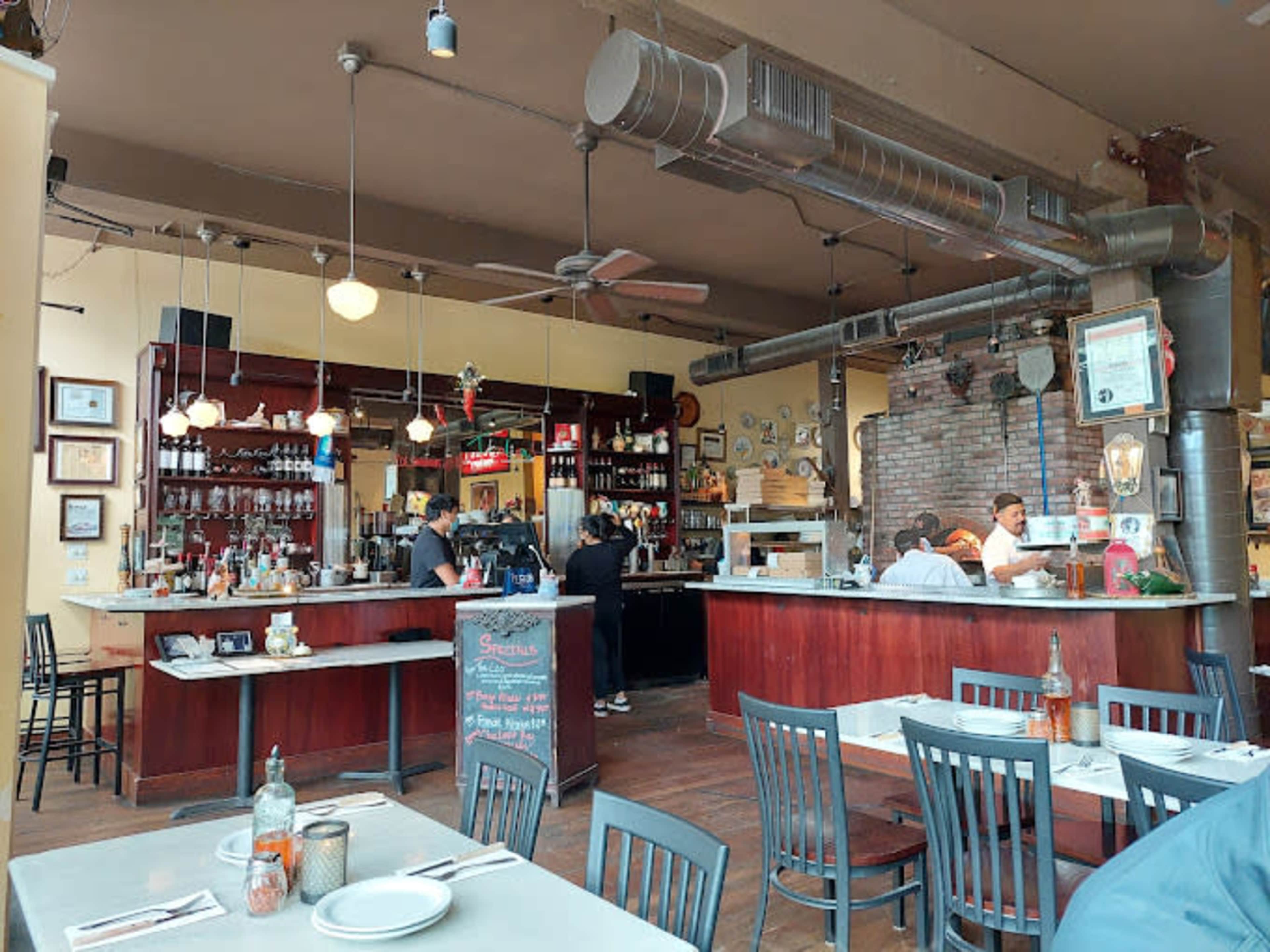 Intimate dining space with wood fired pizza oven in a 1911 building Image in Rainier Valley, Seattle, WA