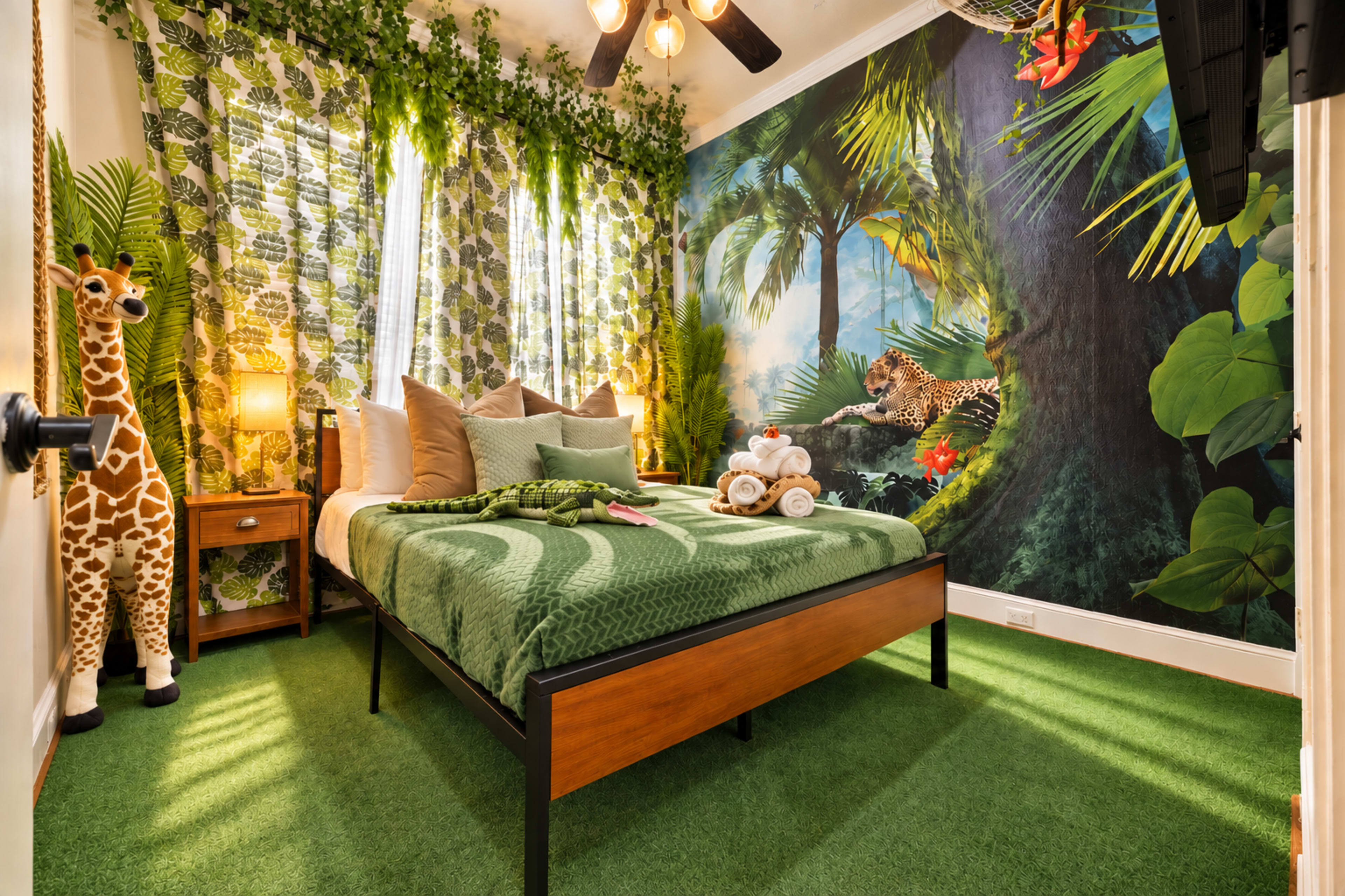 The image shows a bedroom decorated with a jungle-themed mural, a green bedspread, and plush giraffe decorations, along with plants and soft lighting.