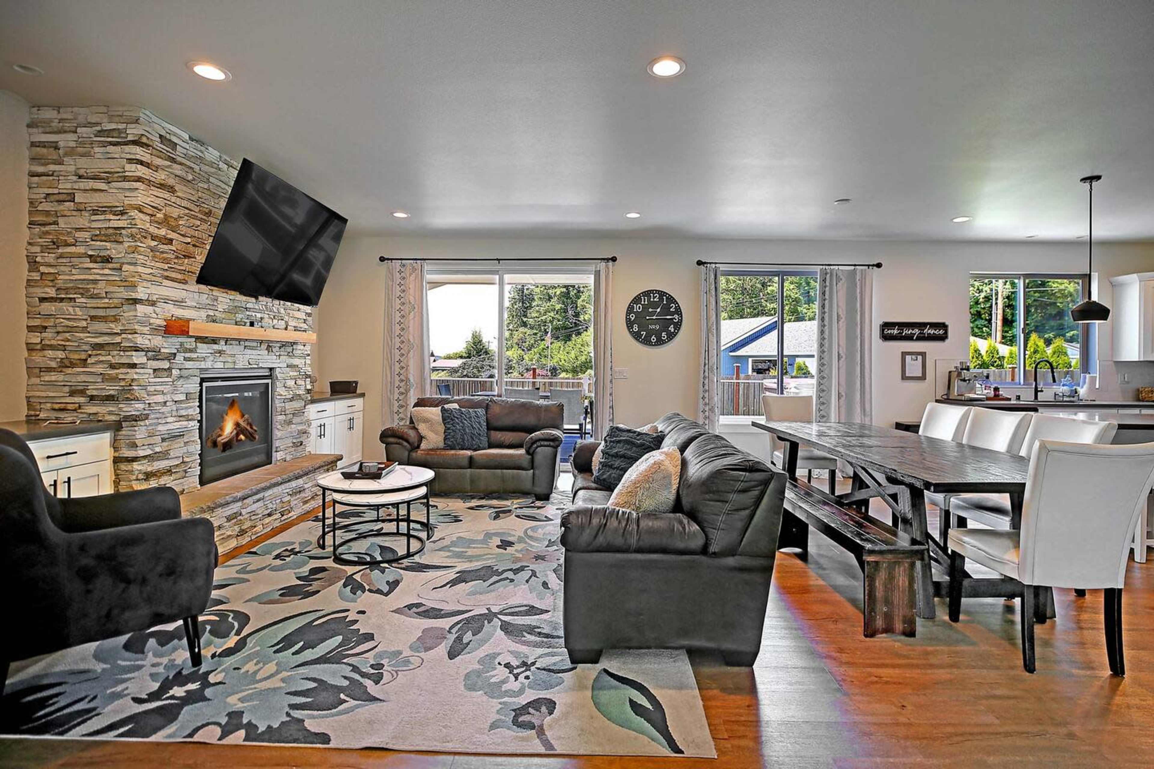 Modern Luxurious Large home with water views, large deck, bbq grill, firepit, gameroom, lots of yard space Image in Camano, Camano Island, WA