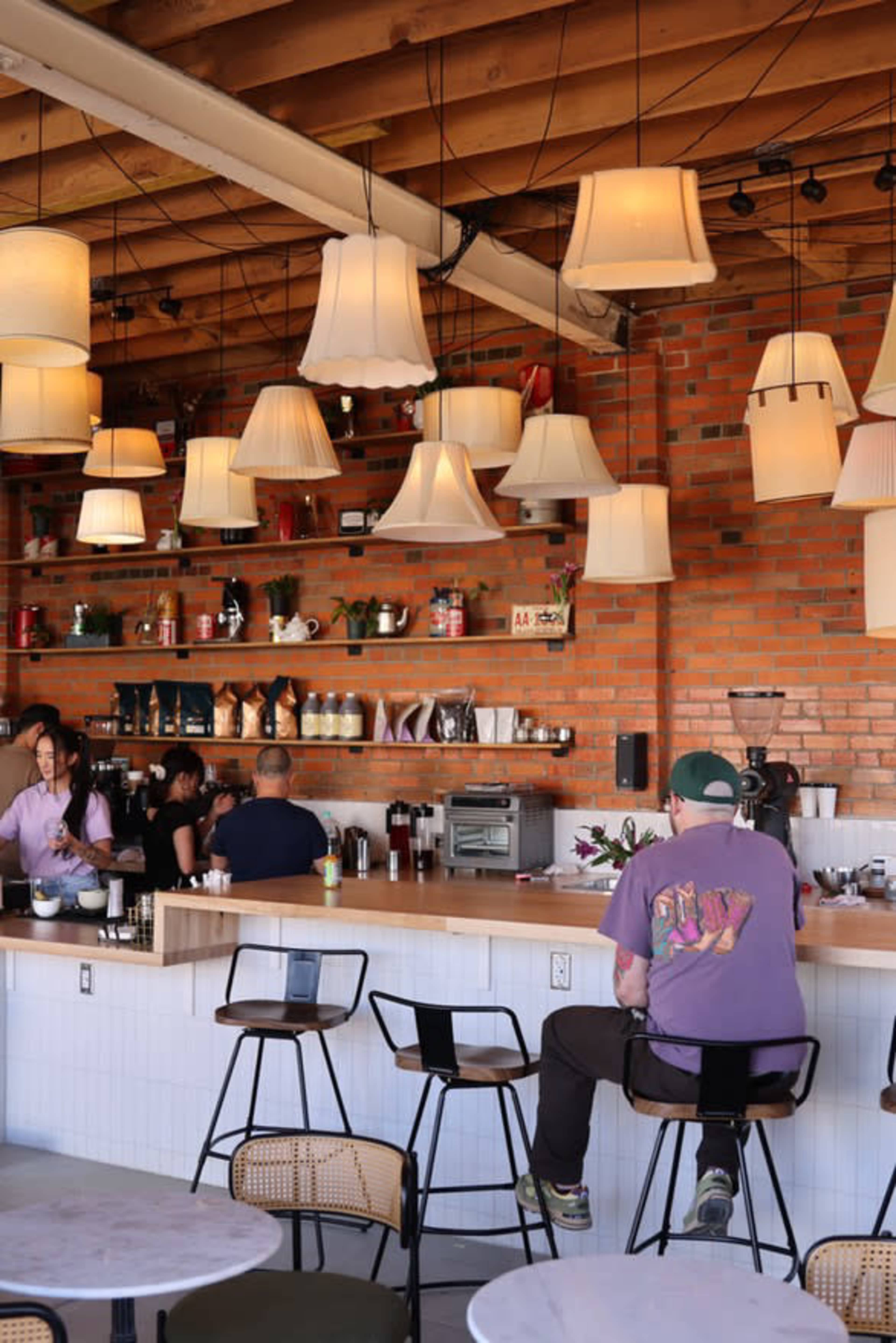 Converted gas station to charming and cozy coffee shop at Sloans Lake. Image in West Colfax, Denver, CO