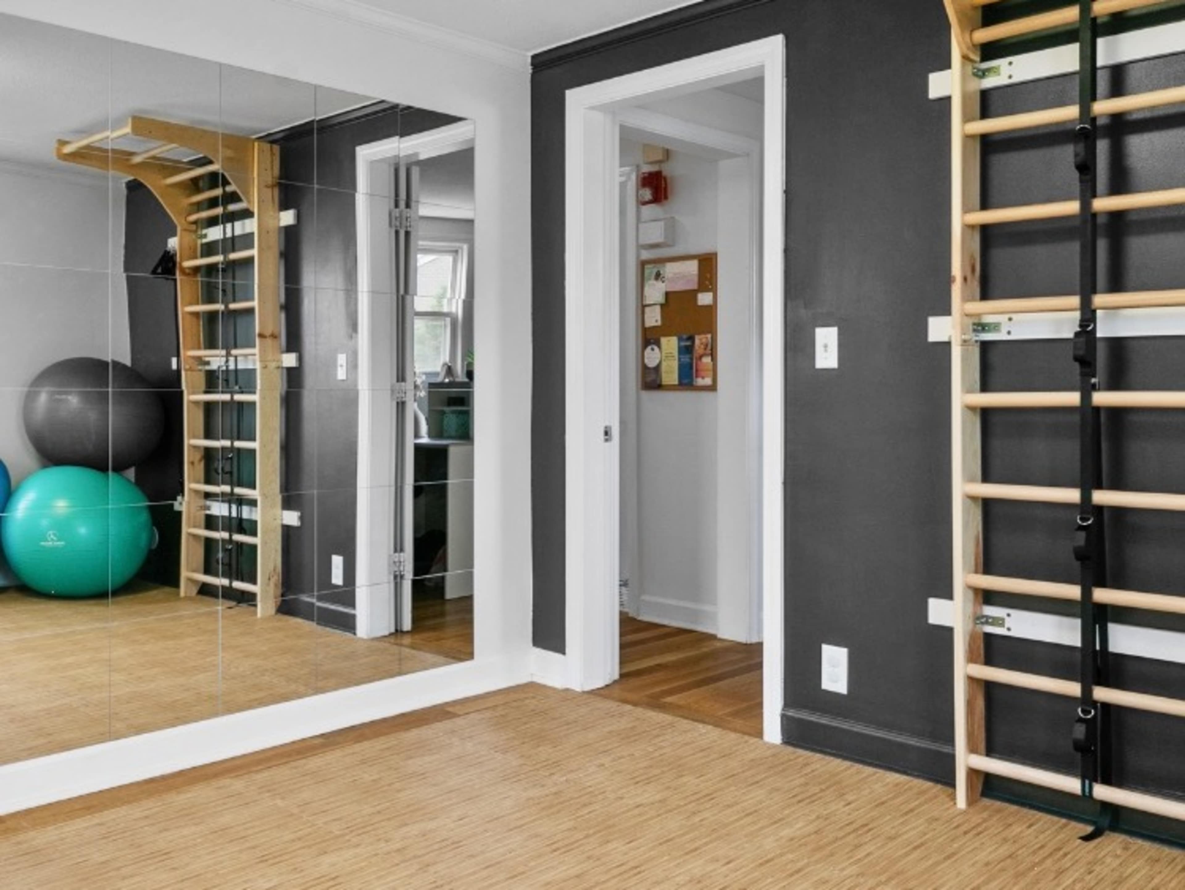 Small gym with padded floor