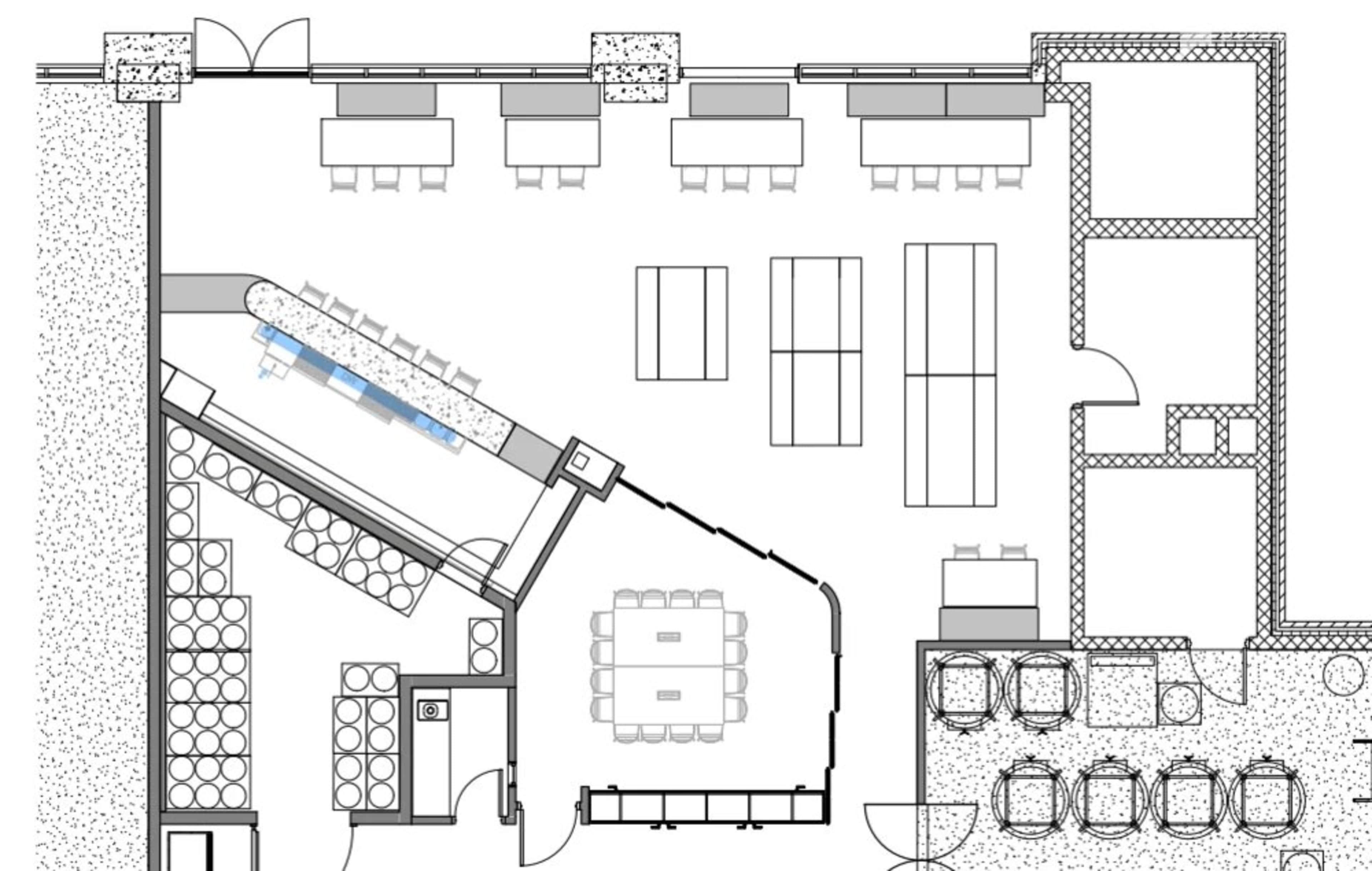 The image is a floor plan layout of a restaurant, featuring dining tables, a bar area, and kitchen facilities.