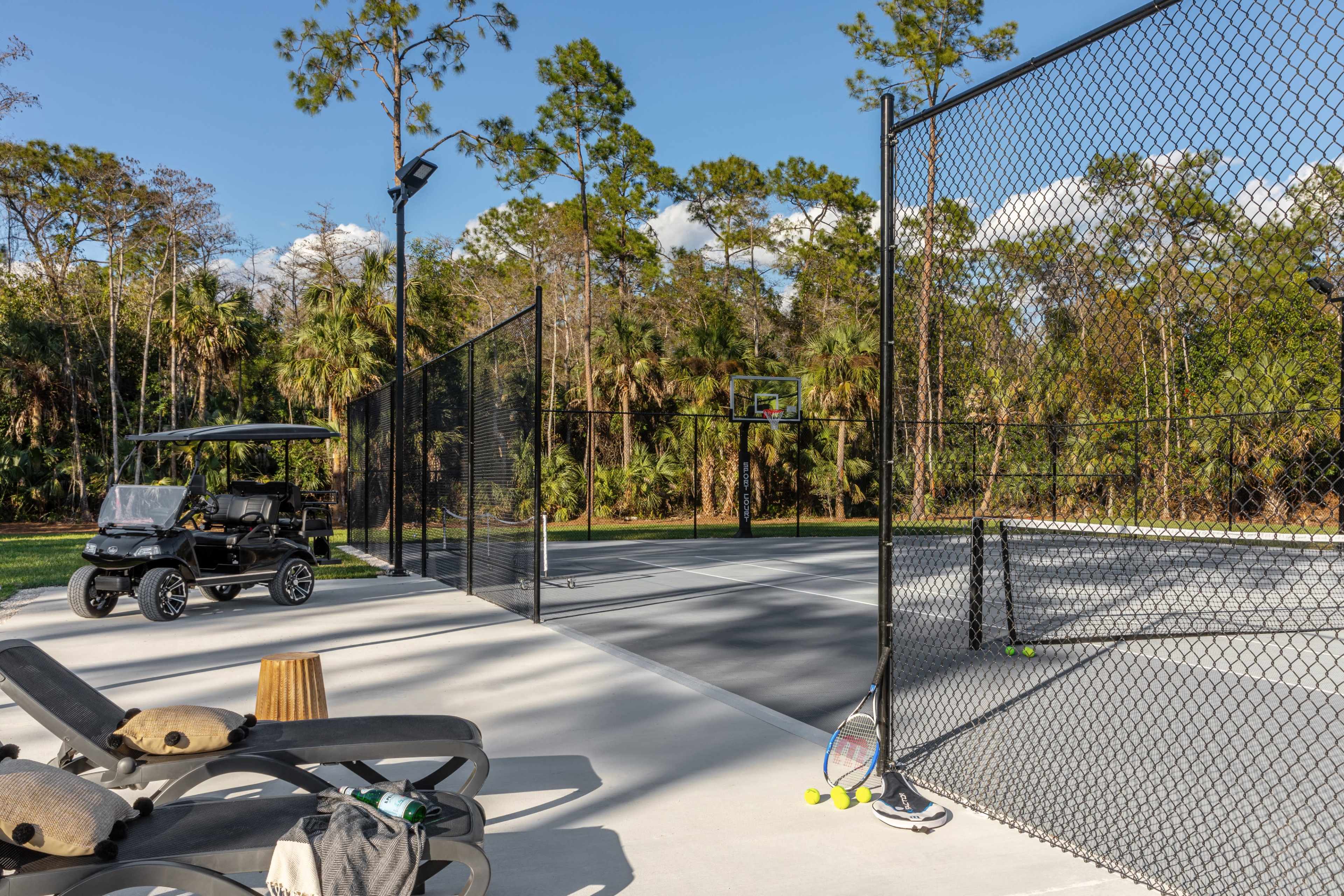 2.5-Acre Estate w/ Cinema, Gym, Pool, Pickle Ball, Hot Tub, Cat Walk, Pool Table - Industrial Modern Aesthetic Image in Urban Estates, Naples, FL