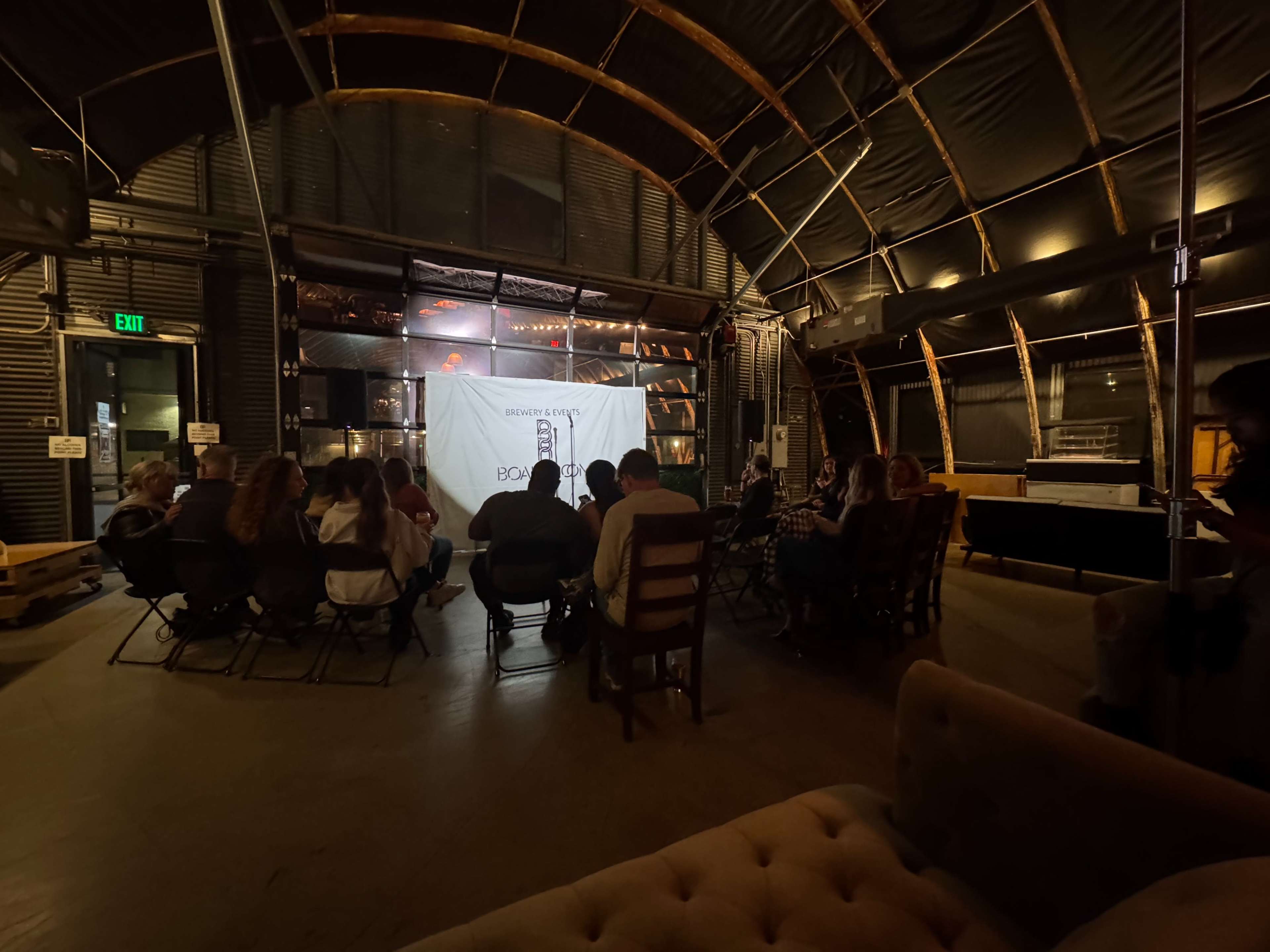 Short throw from Main Street El Segundo with retrofit original quonset hut with tall ceilings, nice industrial steampunk feel softened with warm wood furniture. Image in El Segundo, El Segundo, CA