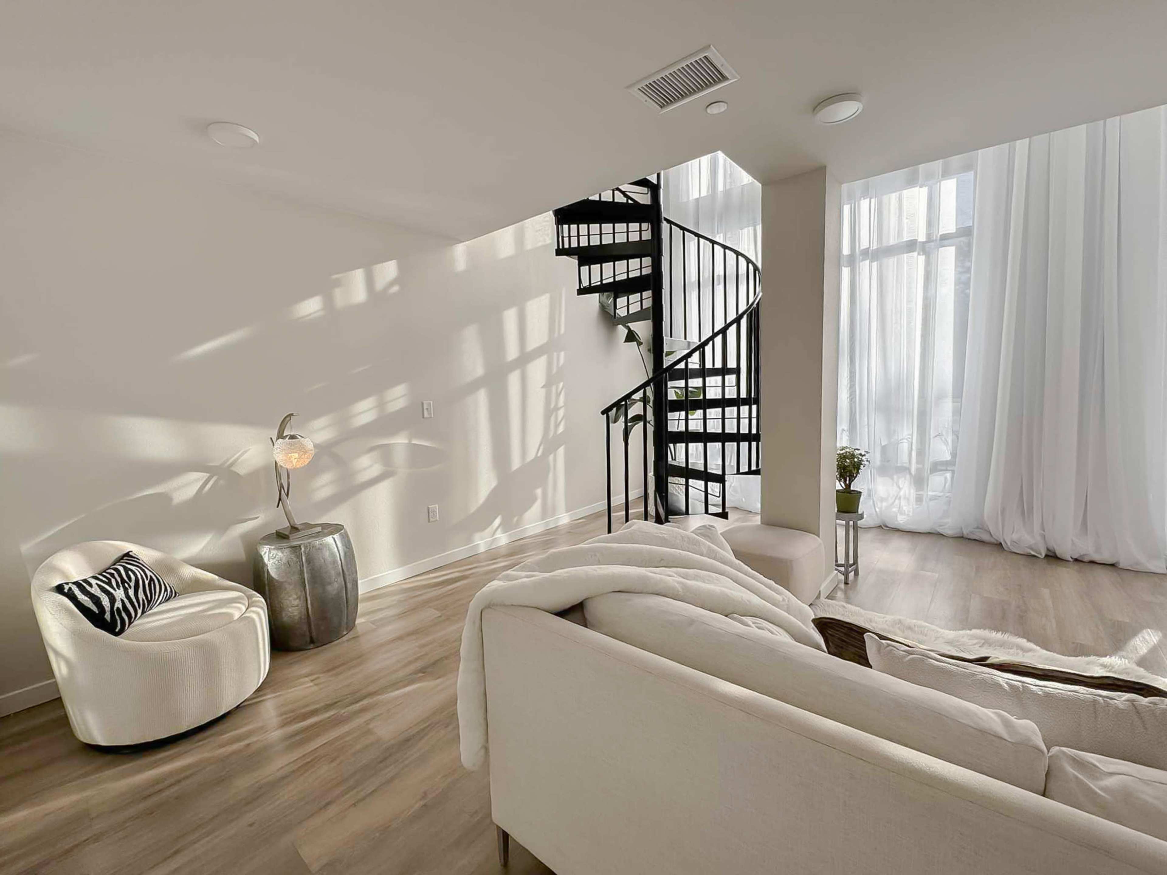 Contemporary Loft with Spiral staircase Image in Baker, Denver, CO