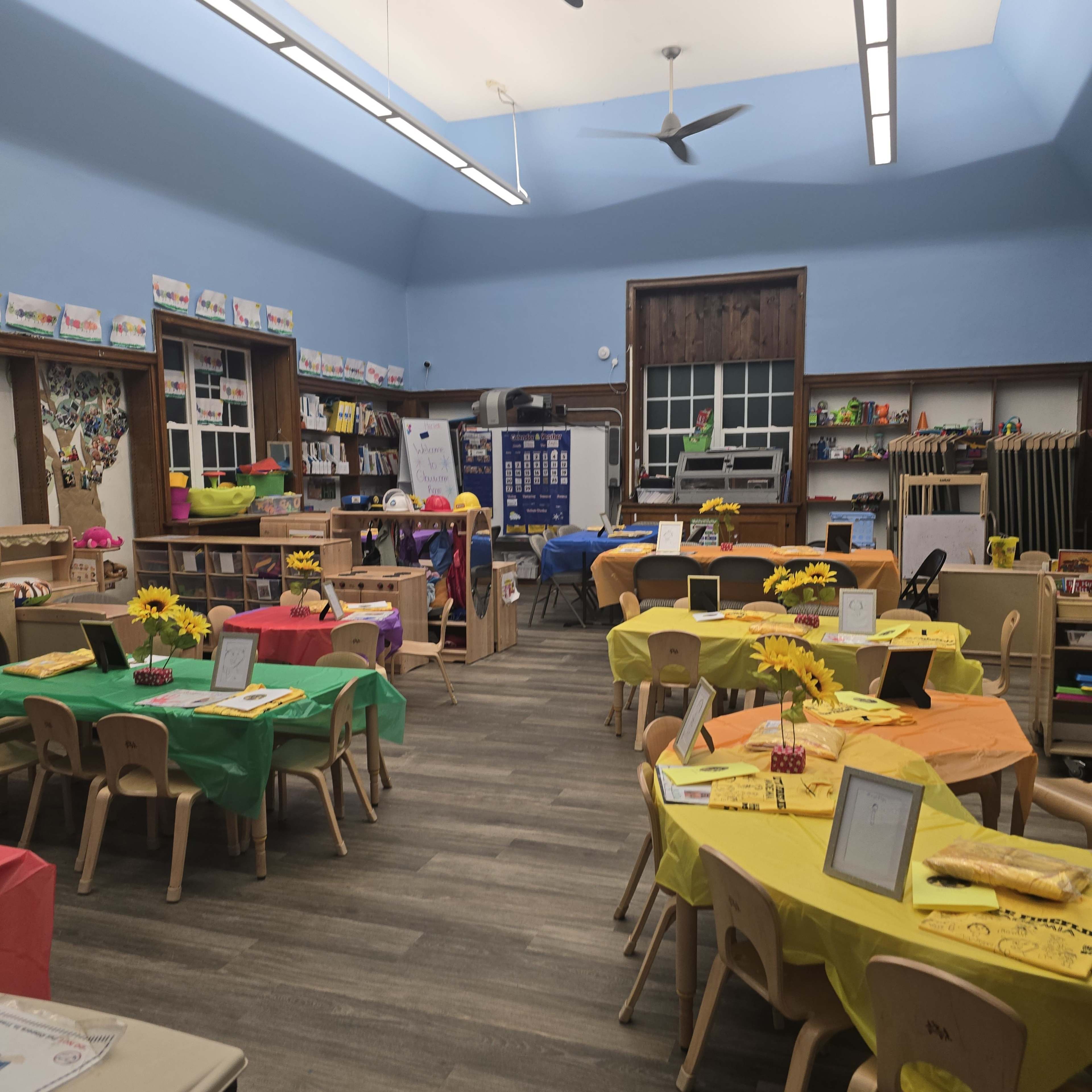 Large preschool classroom setting with kids work and classroom pets. Image in North Township, Hammond, IN