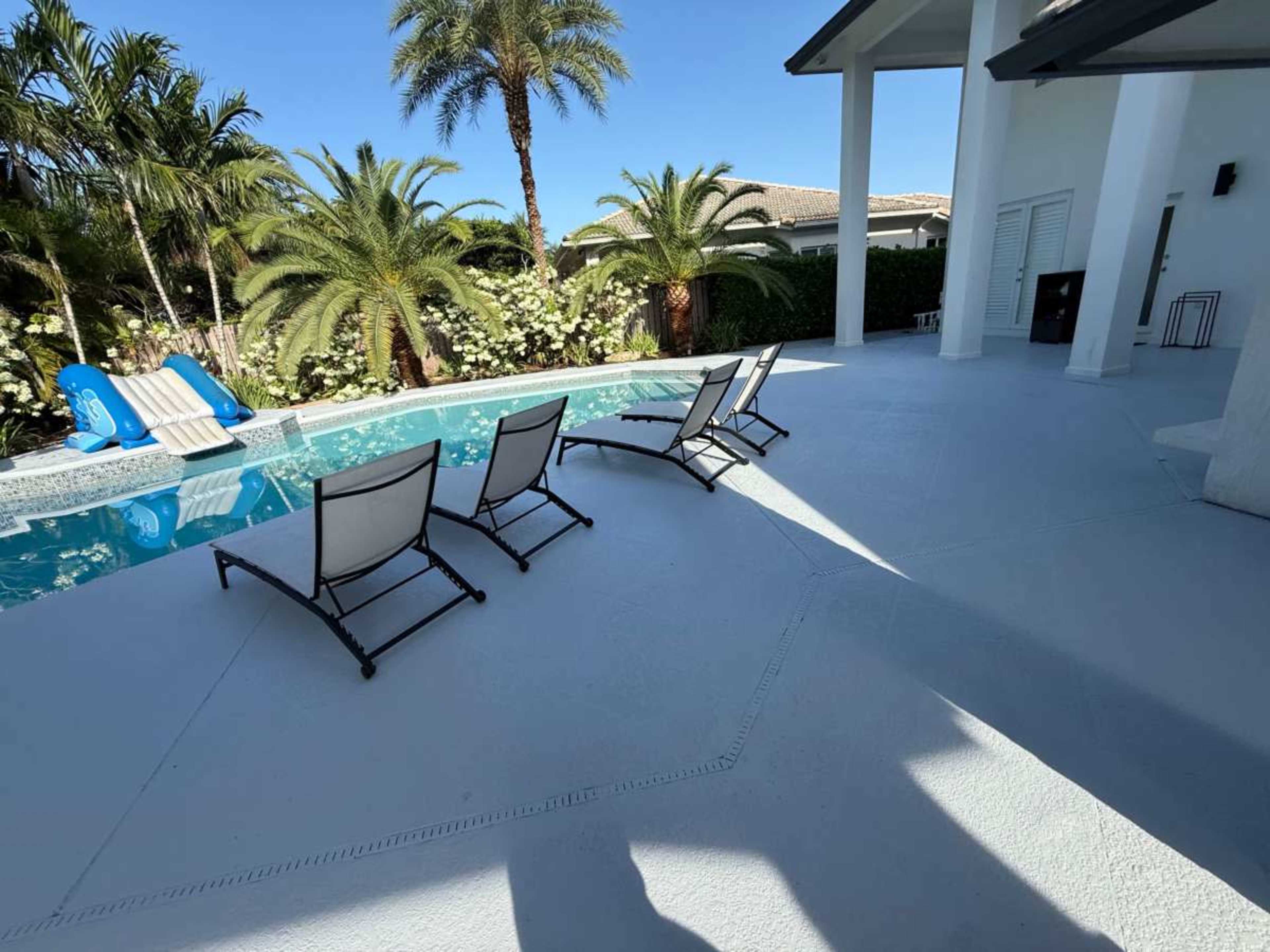 Backyard Oasis with Cabana and Outdoor Kitchen Image in West End, Miami, FL