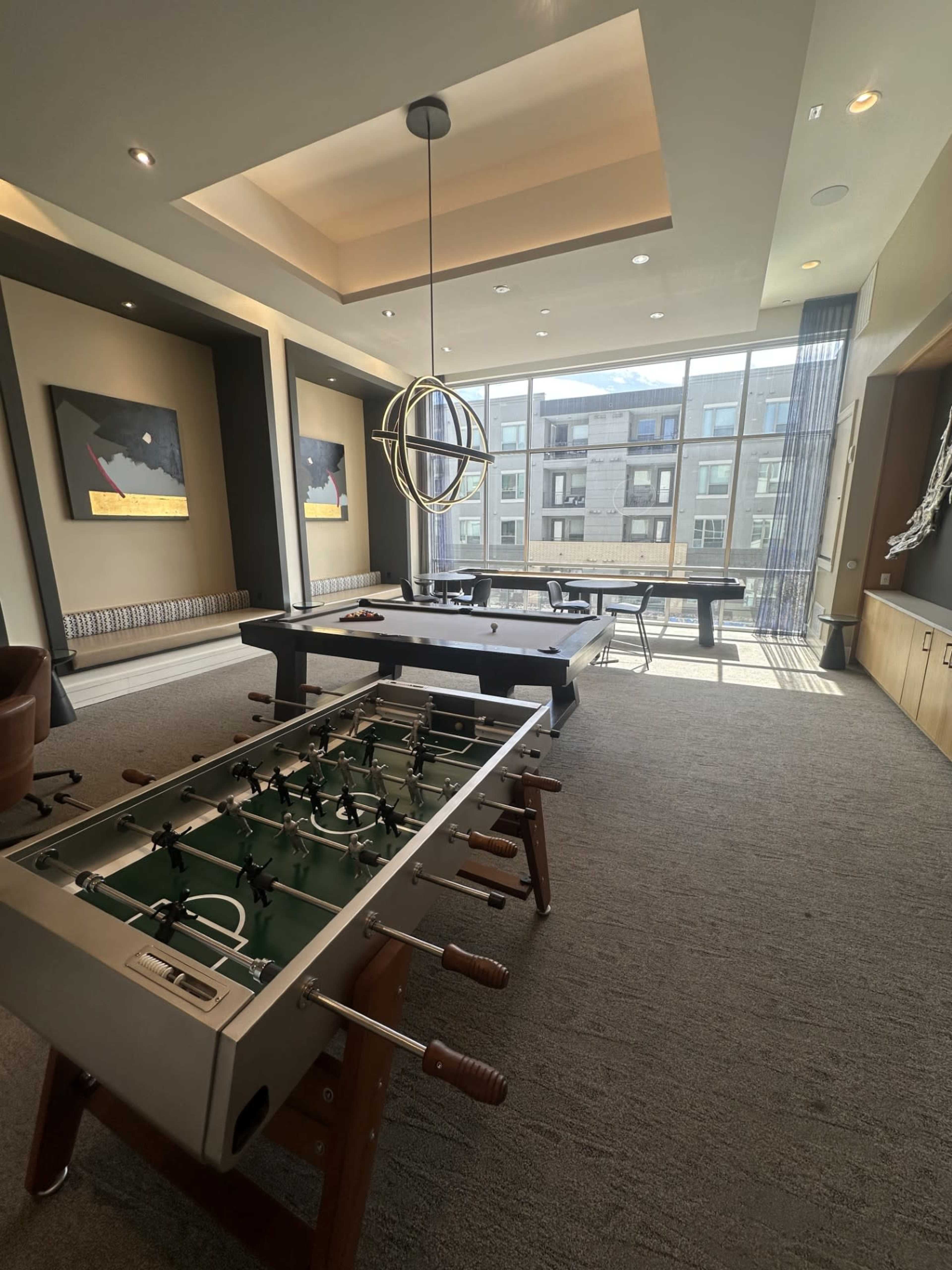Open Game Room with Shuffleboard, Foosball Table, and Pool Table perfect for your next event Image in Lowry, Denver, CO