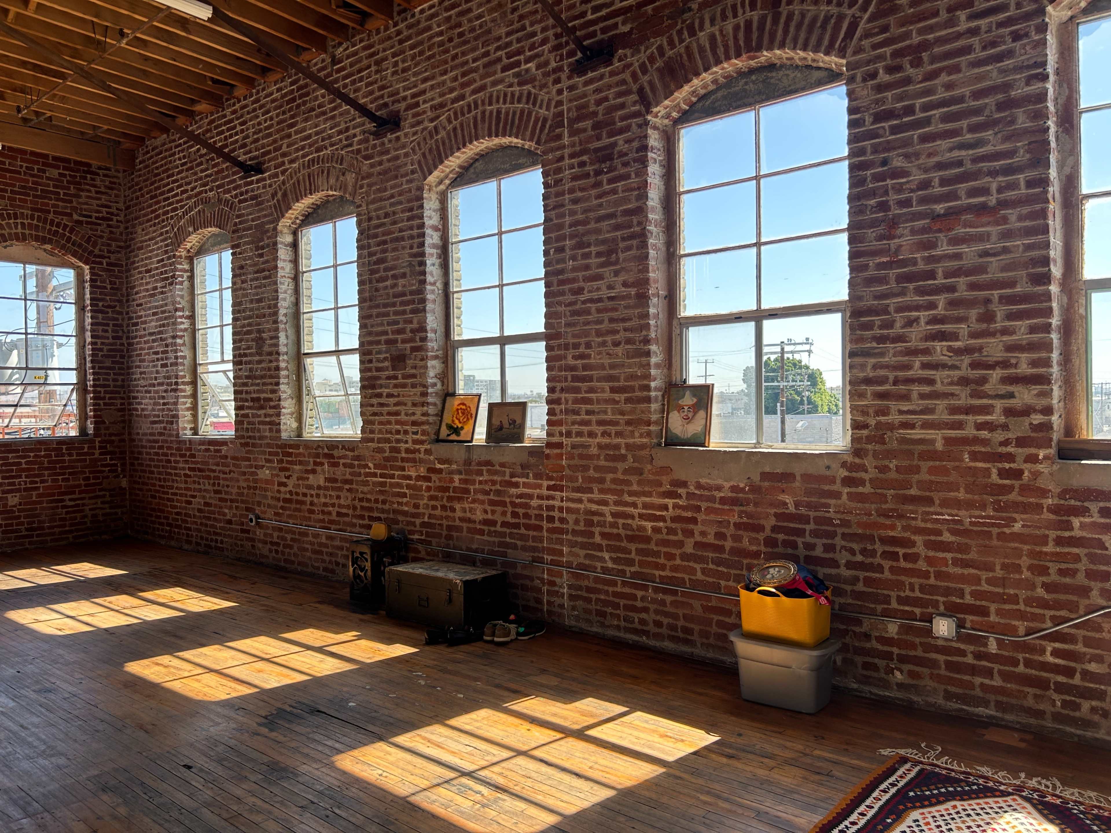 Sunlit Brick Loft Studio with Vintage Details & Wood Floors Image in Central LA, Los Angeles, CA