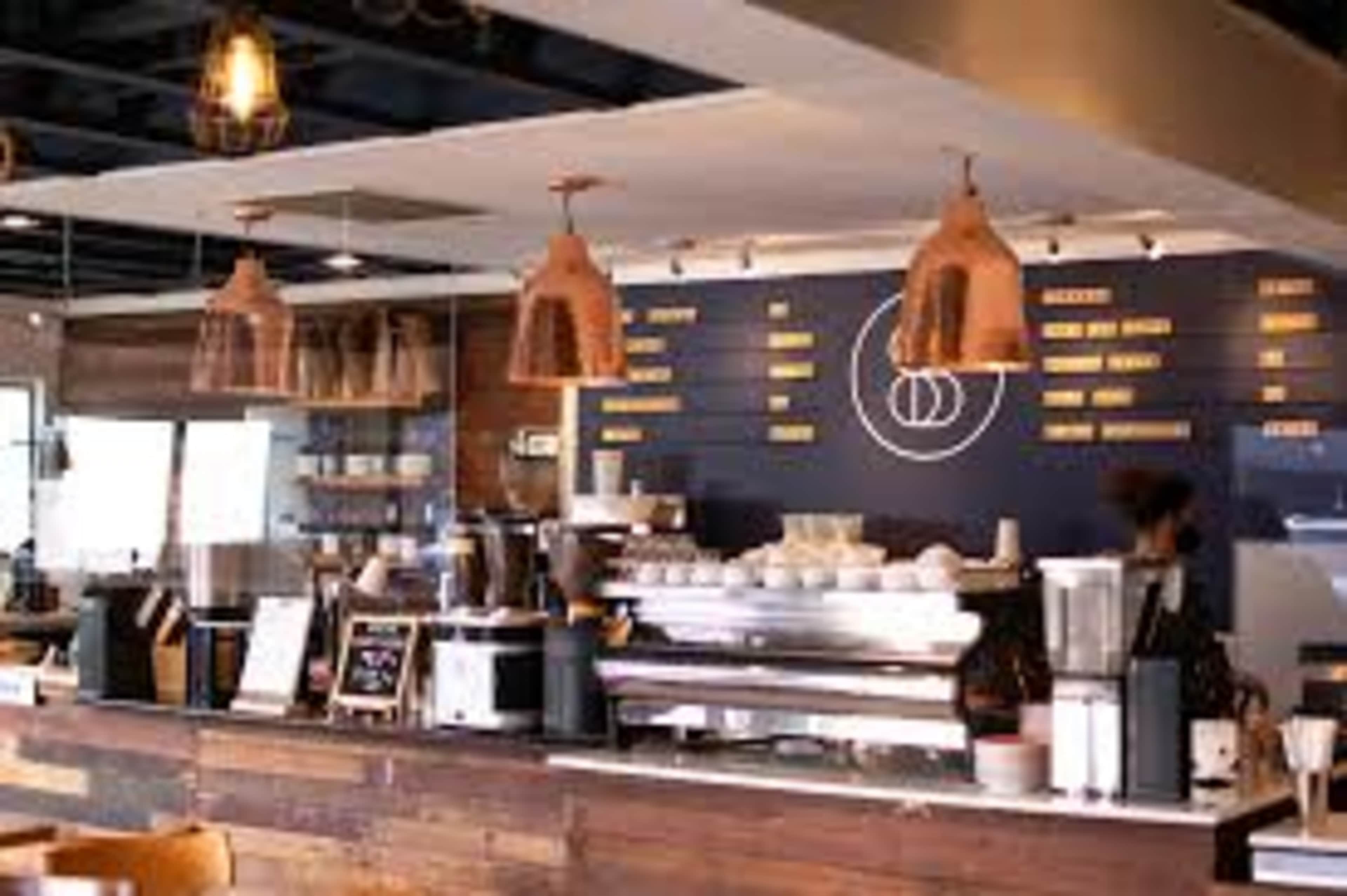 Charming Cafe with Exposed Brick & Natural Light Image in Virginia Village, Denver, CO