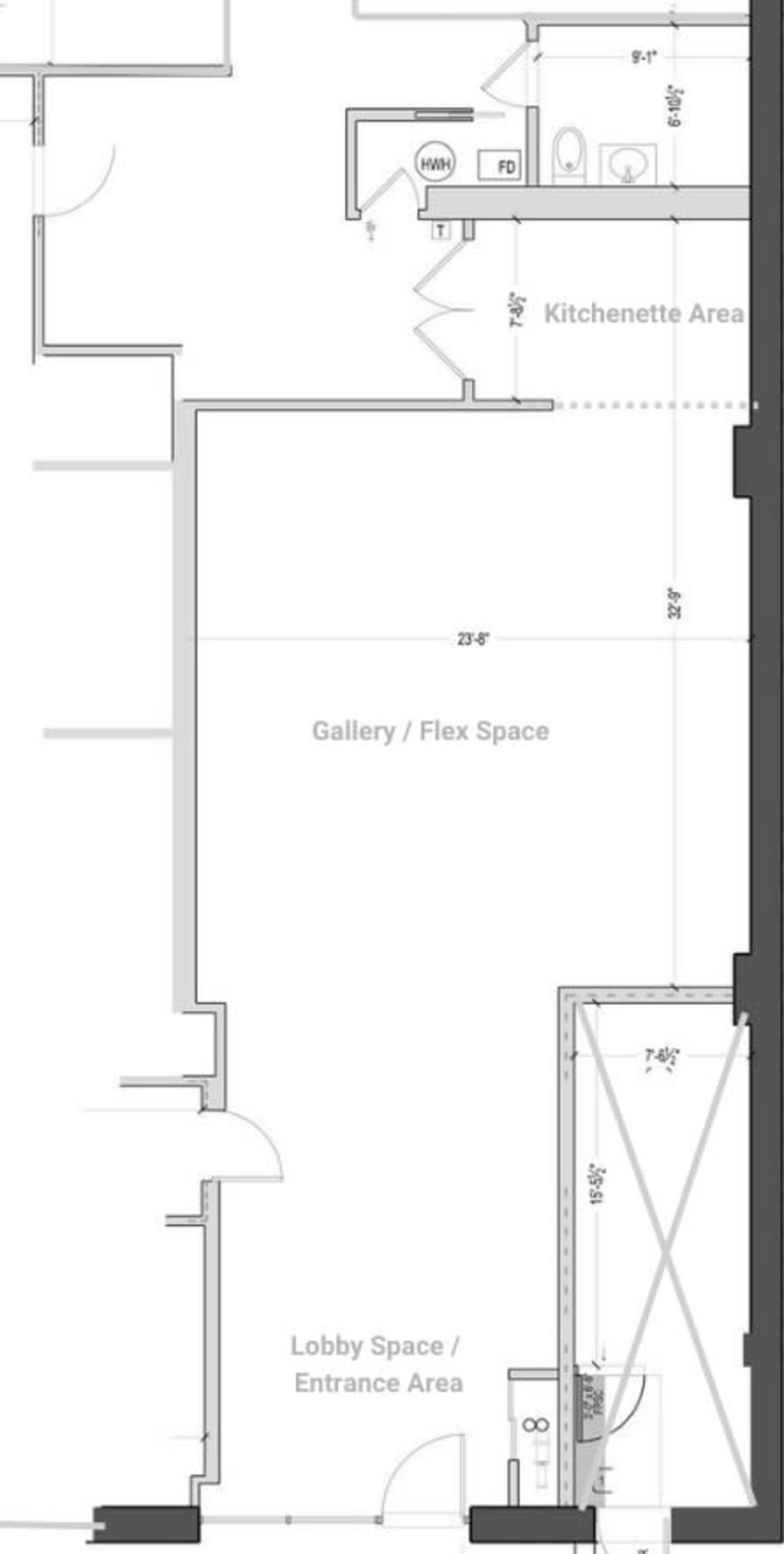 The image shows a floor plan layout featuring a lobby/entrance area, a gallery/flex space, and a kitchenette area.