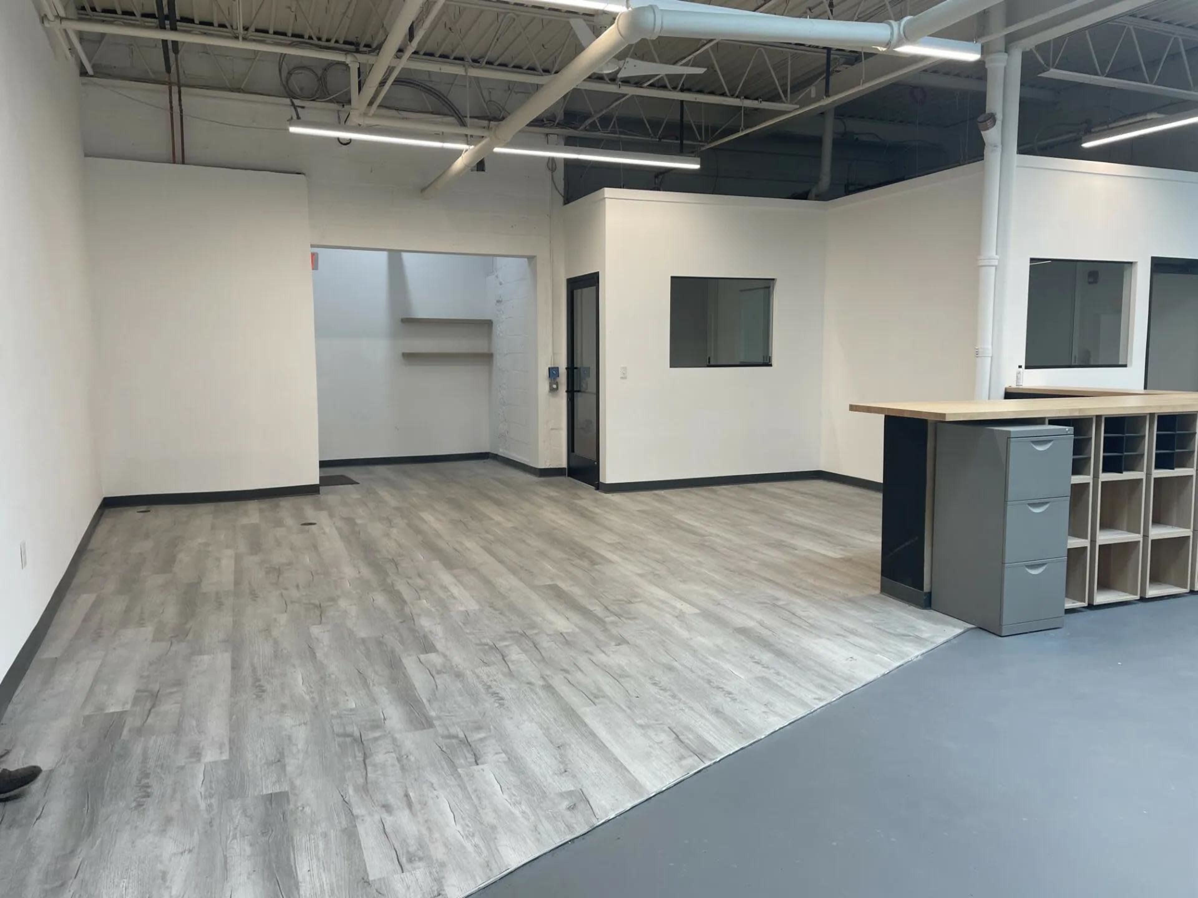 Open-Concept Industrial Hall Image in Ward Two, Somerville, MA