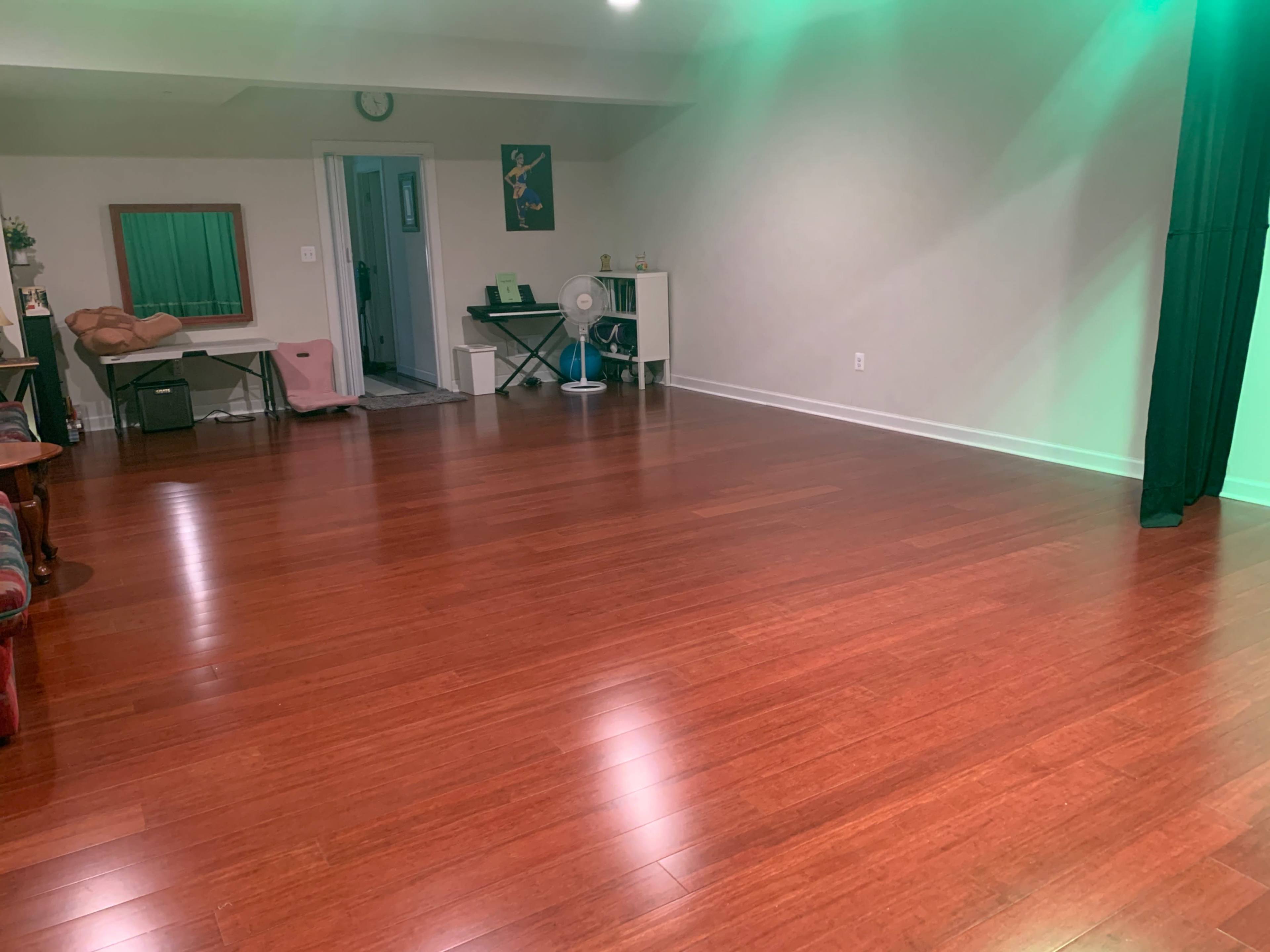 Entertainment room with continuous floor space and backdrop curtain Image in Maple Lawn, Fulton, MD