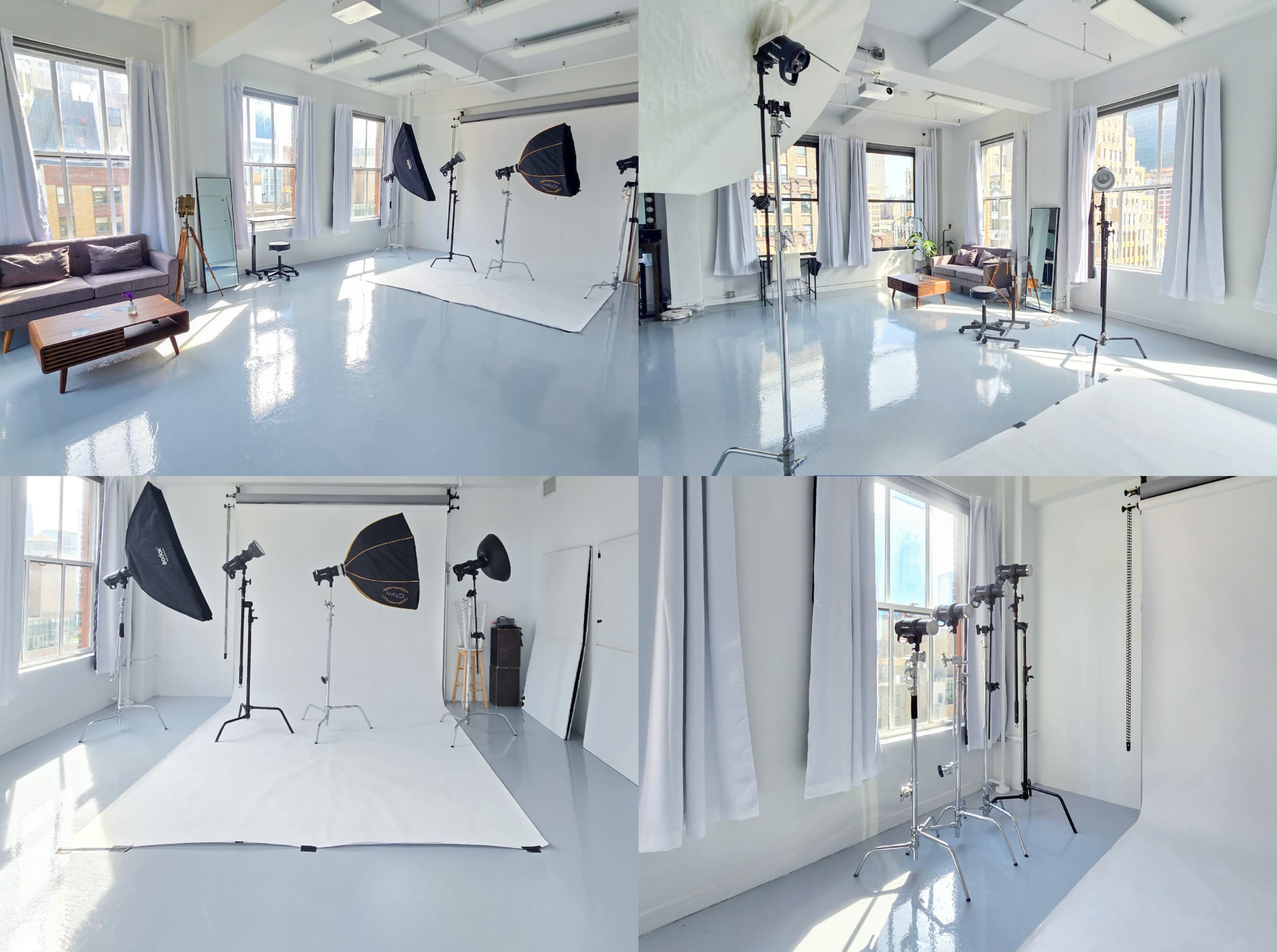 The image shows a bright studio space with large windows, equipped with photography lighting setups and a white backdrop.