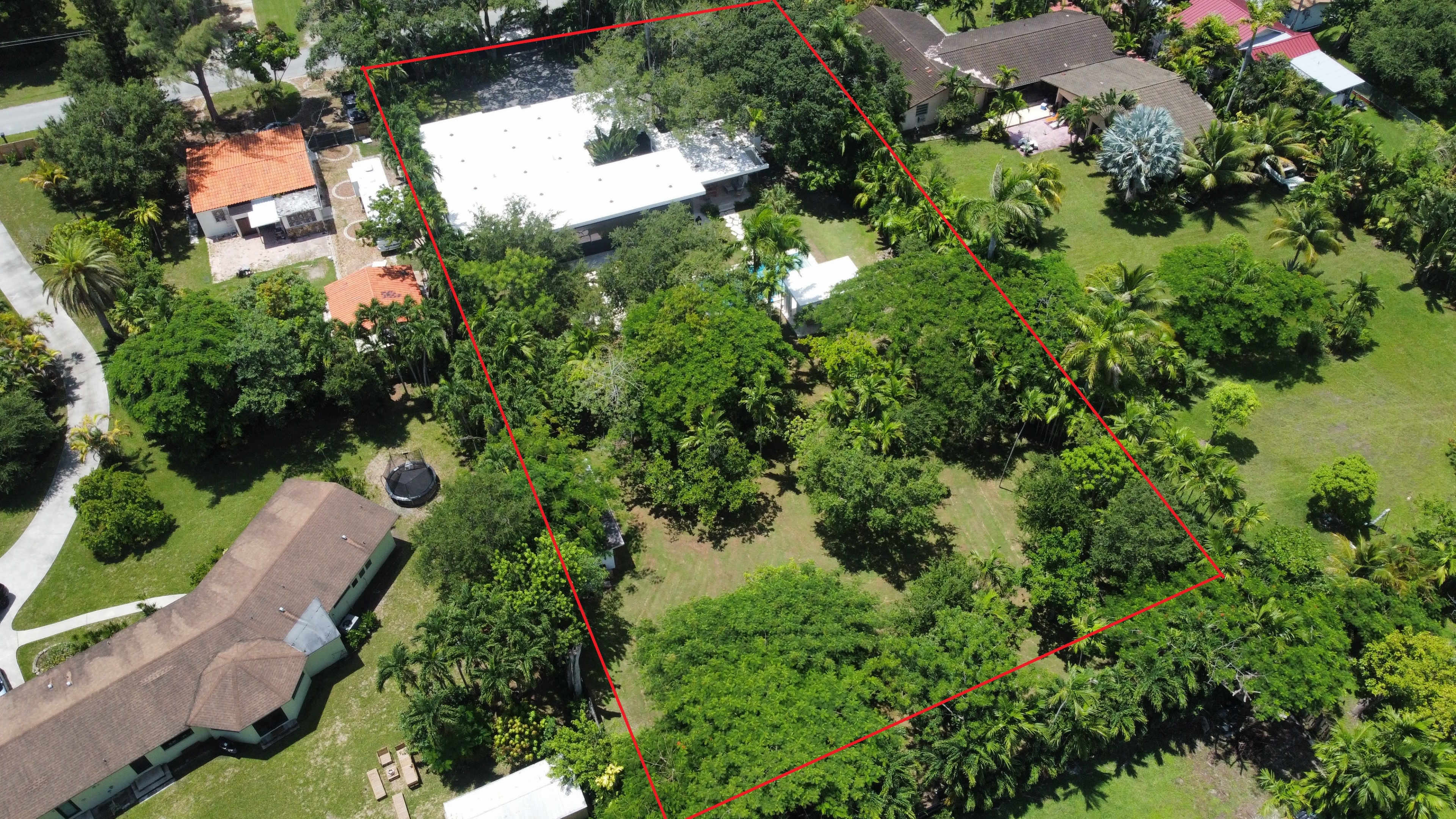 Modern Tropical Estate with Lush Tropical Landscape, Pool, and Cabana North Miami Image in Biscayne Gardens, Miami, FL