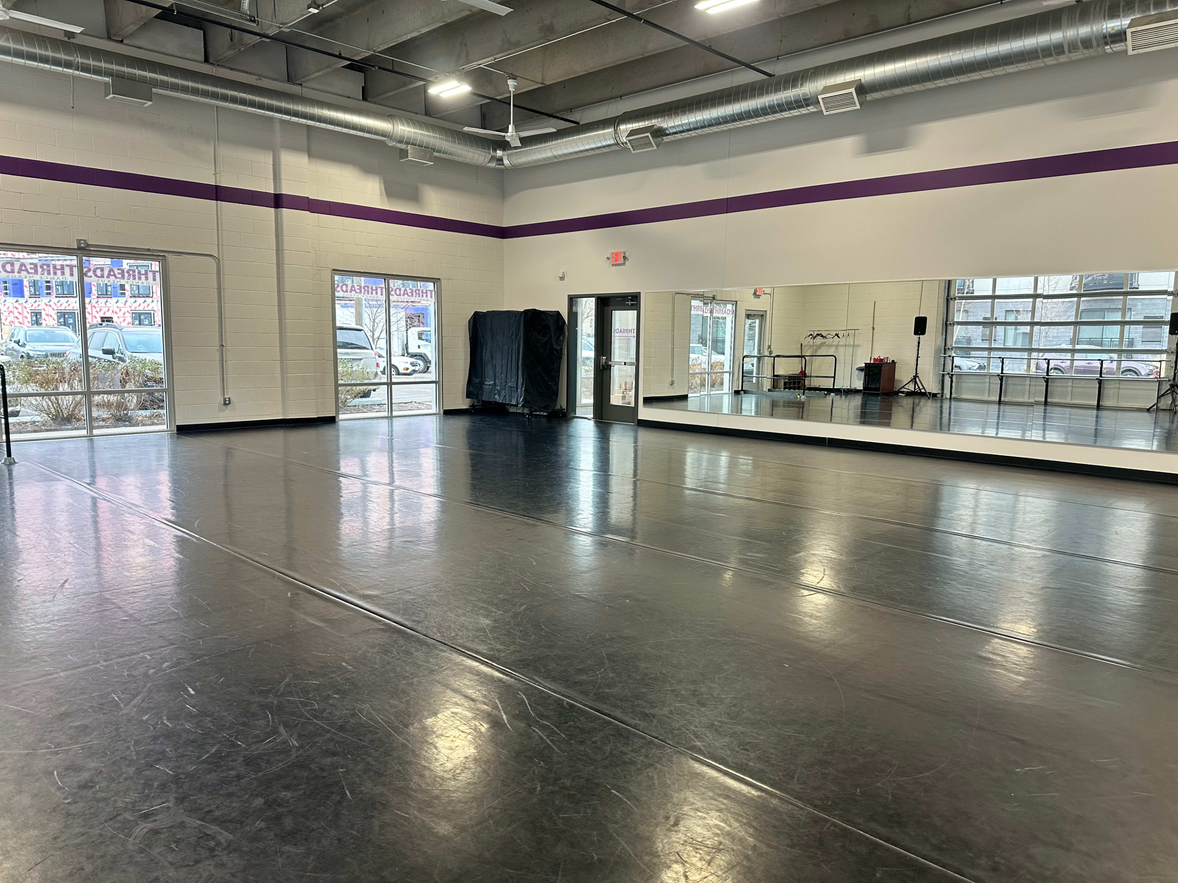 Industrial Dance Studio with Floor to Ceiling Windows Image in Seward, Minneapolis, MN