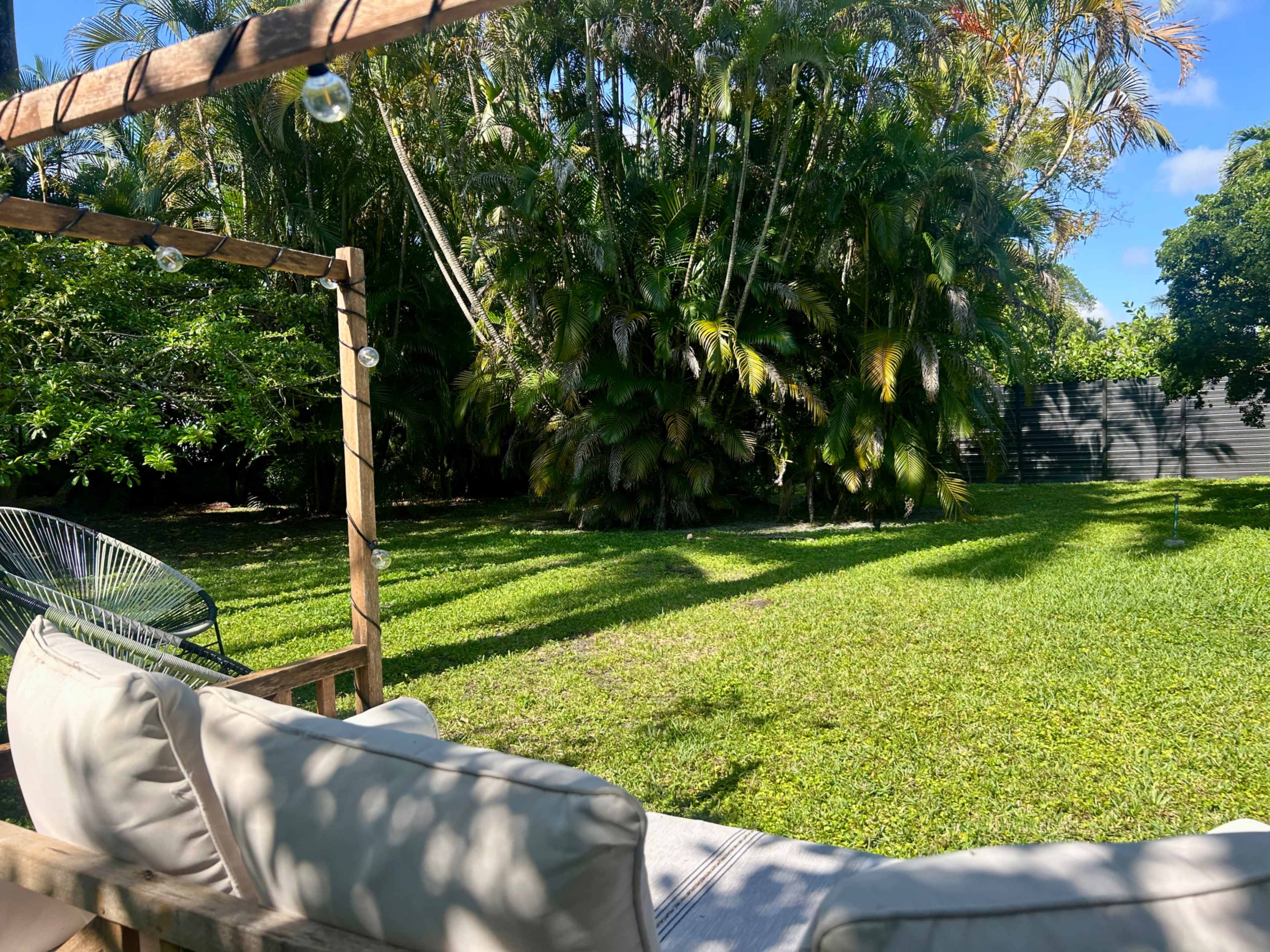 Tulum Jungle Oasis in Miami – Lush Tropical Backyard with Deck & Couch for Shoots, Wellness, and Events Image in , Miami, FL