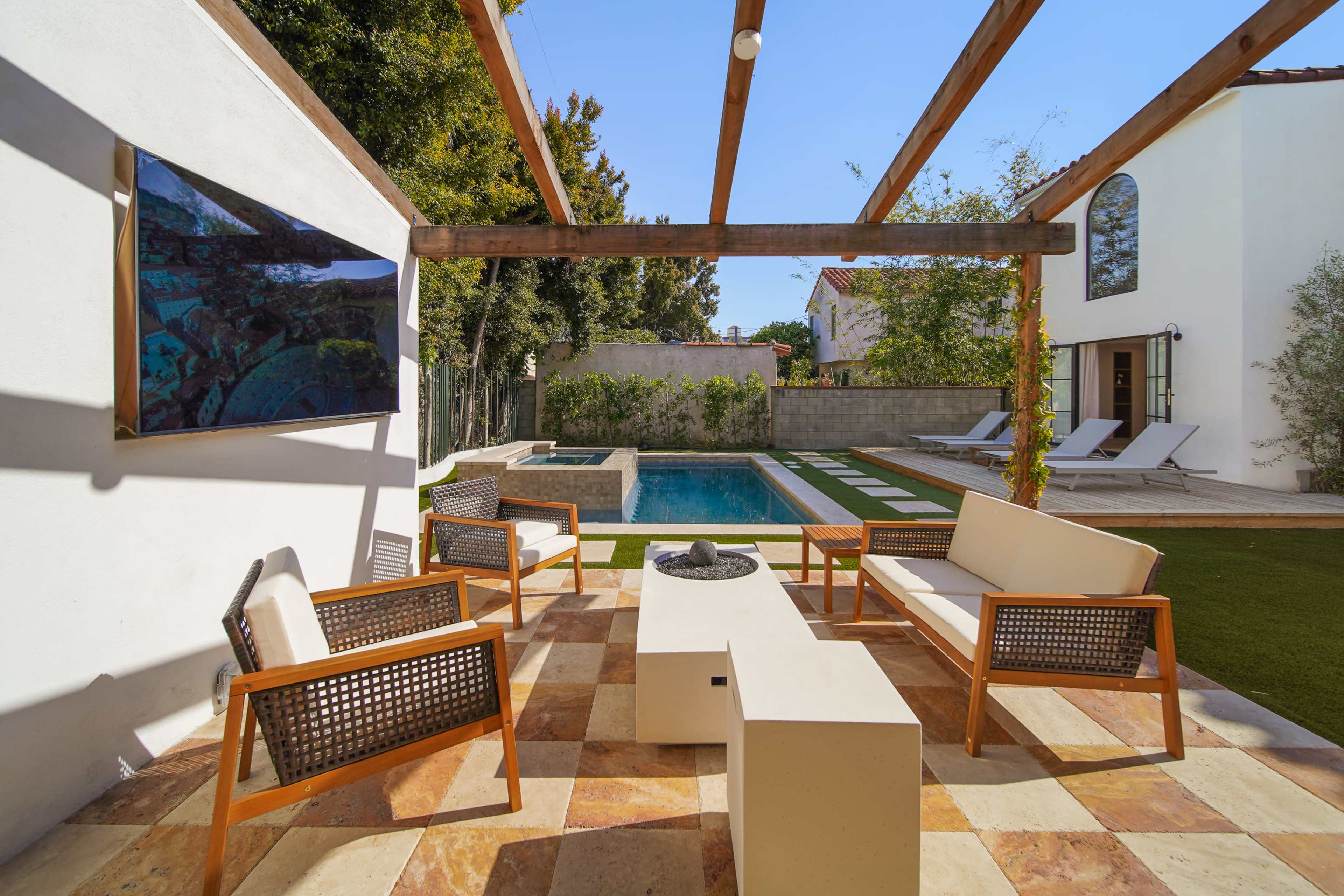 MODERN SPANISH VILLA WITH ARCHES, BEAMS & POOL Image in Central LA, Los Angeles, CA