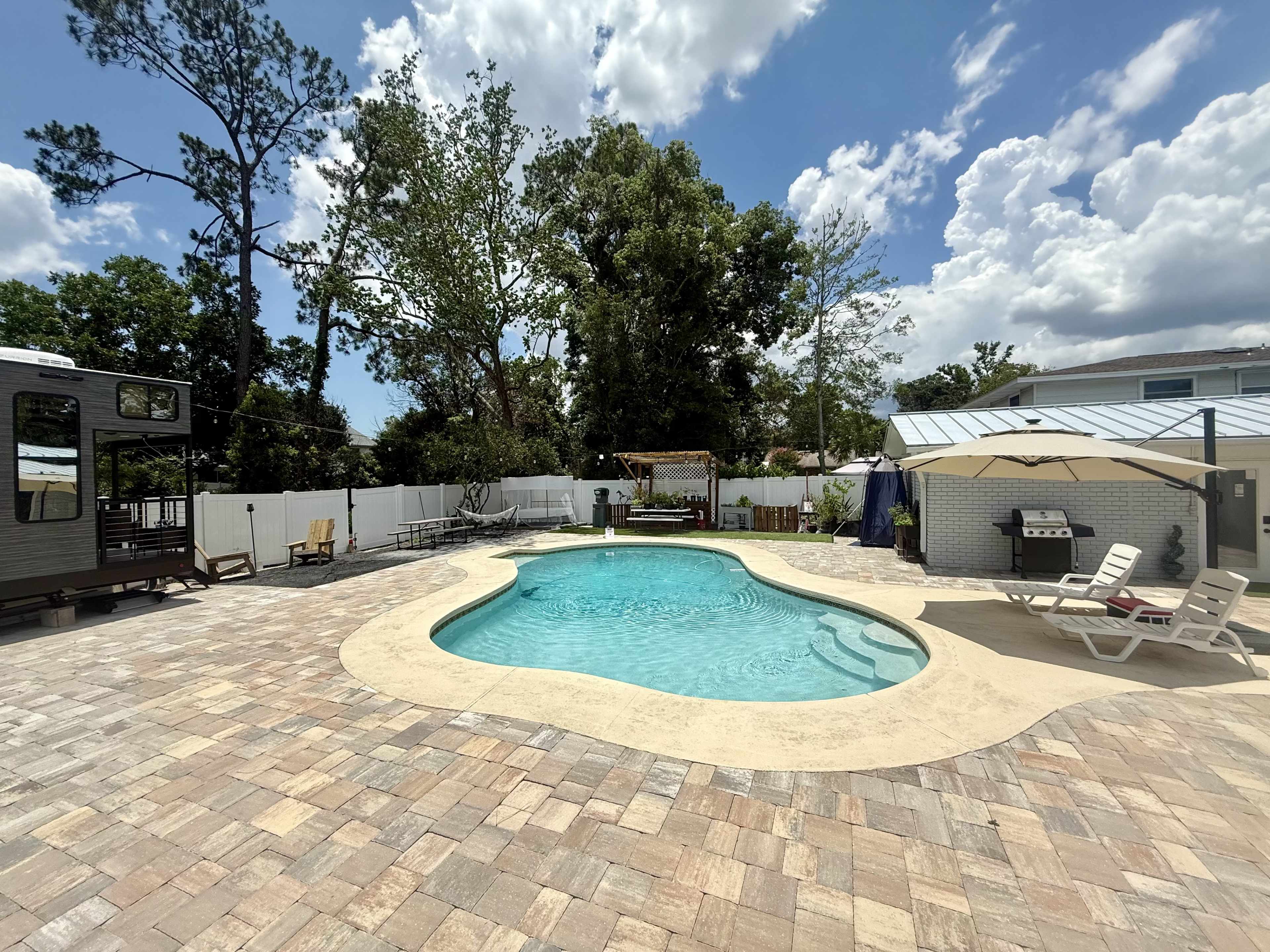 The Arlington Backyard Oasis – Private Outdoor Retreat with Poolside Vibes, Movies & Game Nights Image in Arlingwood, Jacksonville, FL