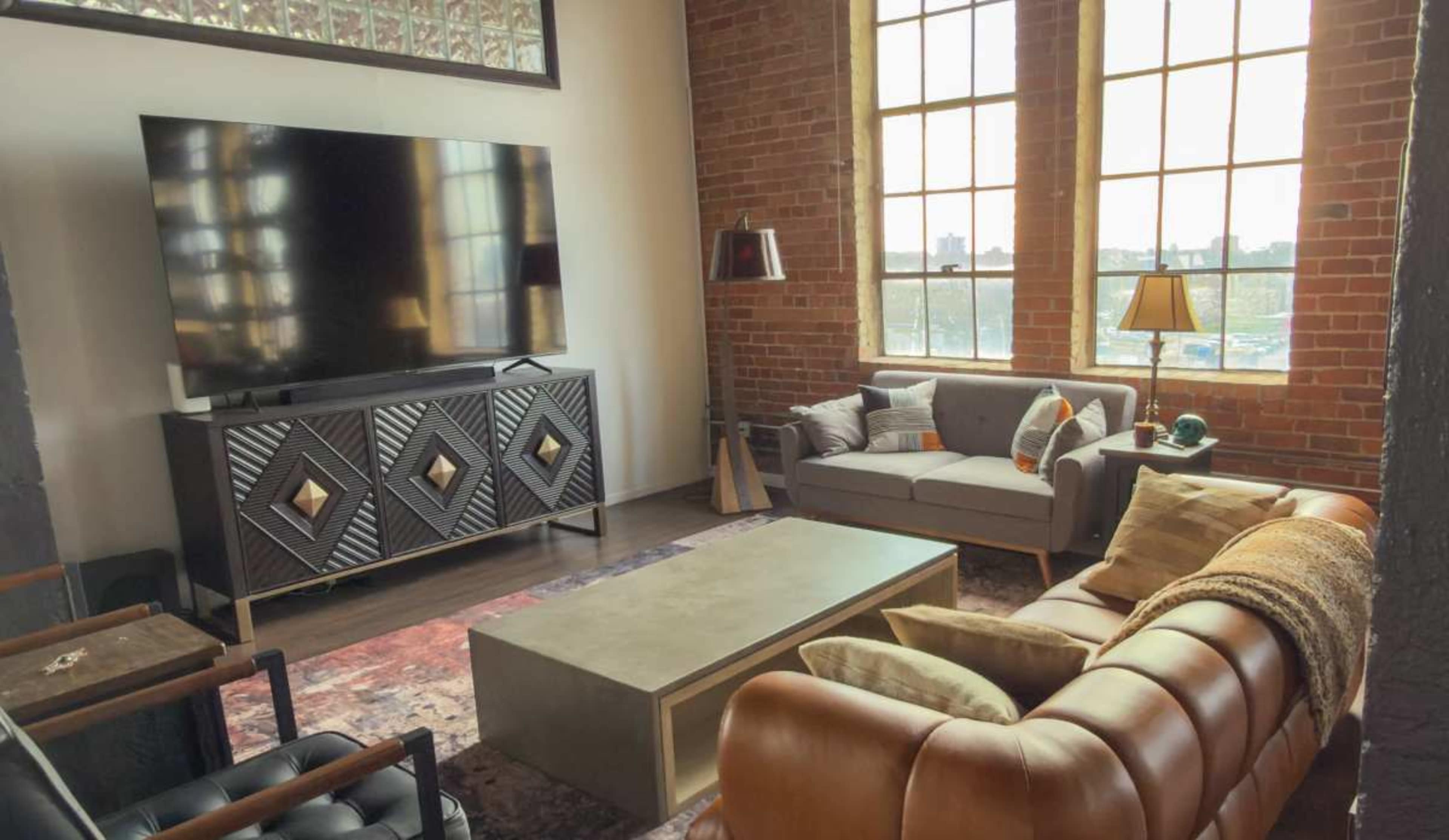 Stunning Urban Industrial Loft with Natural Light & Unmatched Detroit Skyline View Image in Eastern Market, Detroit, MI