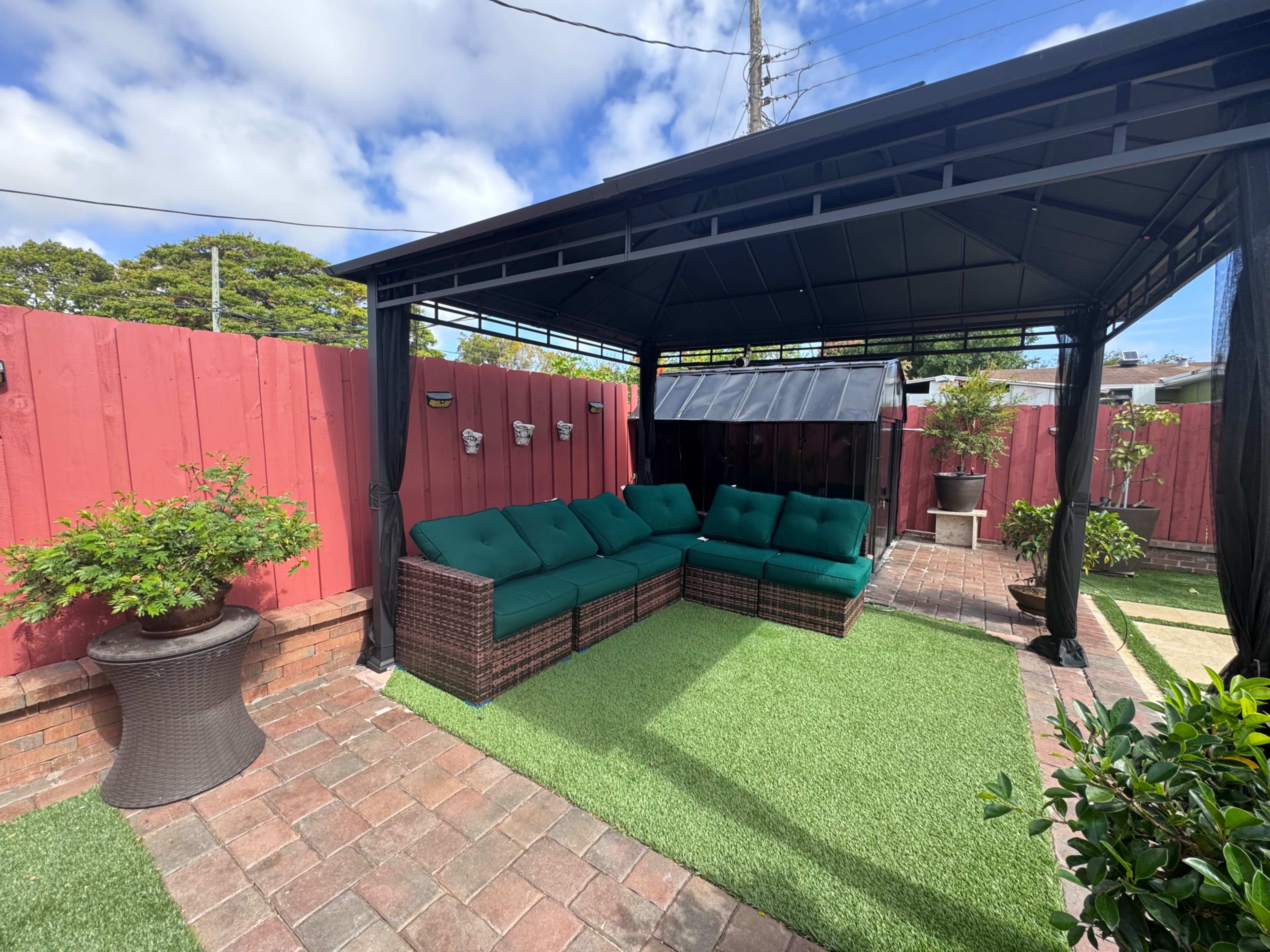 Spacious Backyard with Pool and Outdoor Kitchen Image in Pompano Beach, Pompano Beach, FL