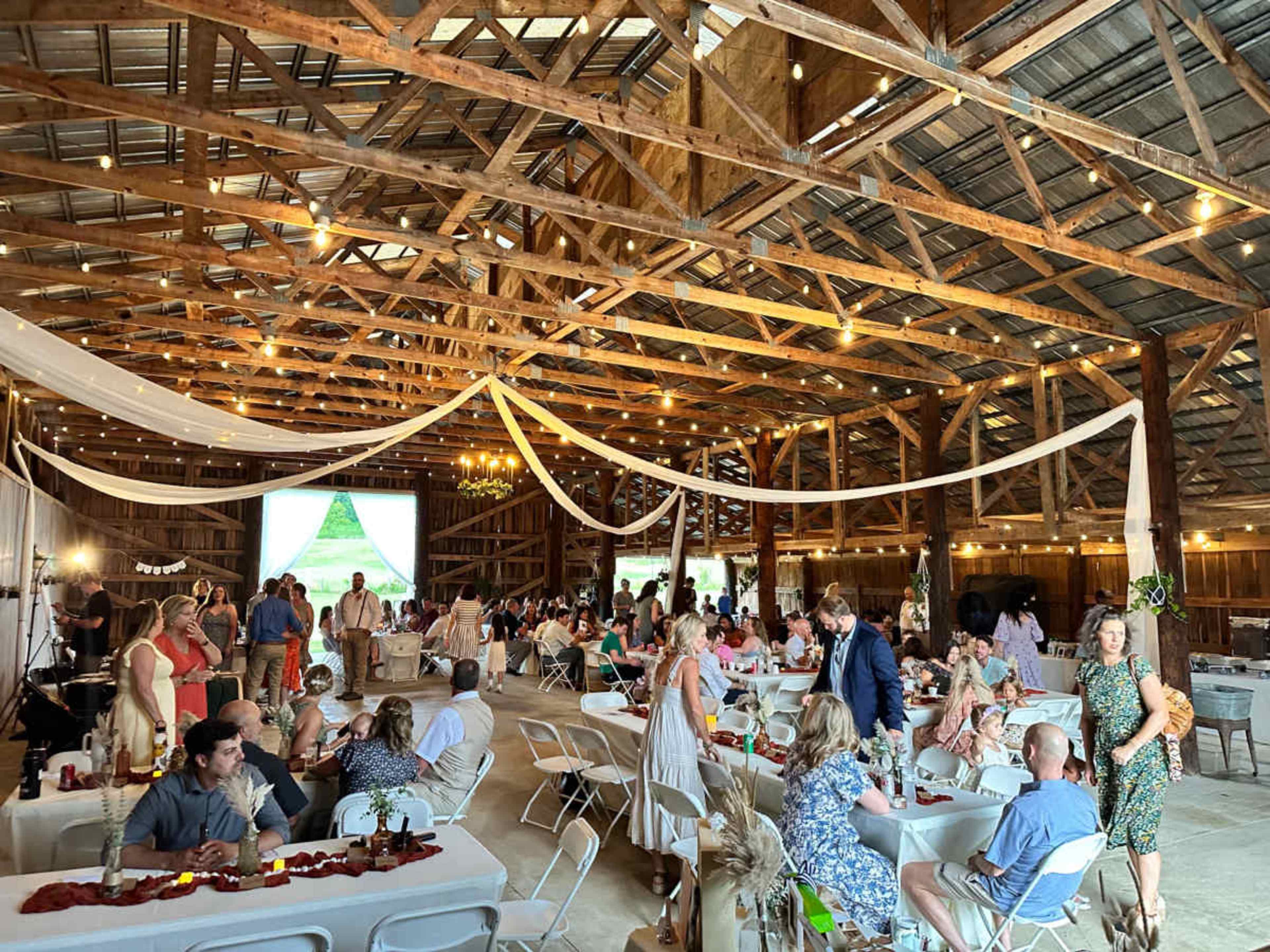 Rustic Barn Venue with Scenic Pond, String Lights, and Cozy On-Site Lodging Image in , Gallatin, TN