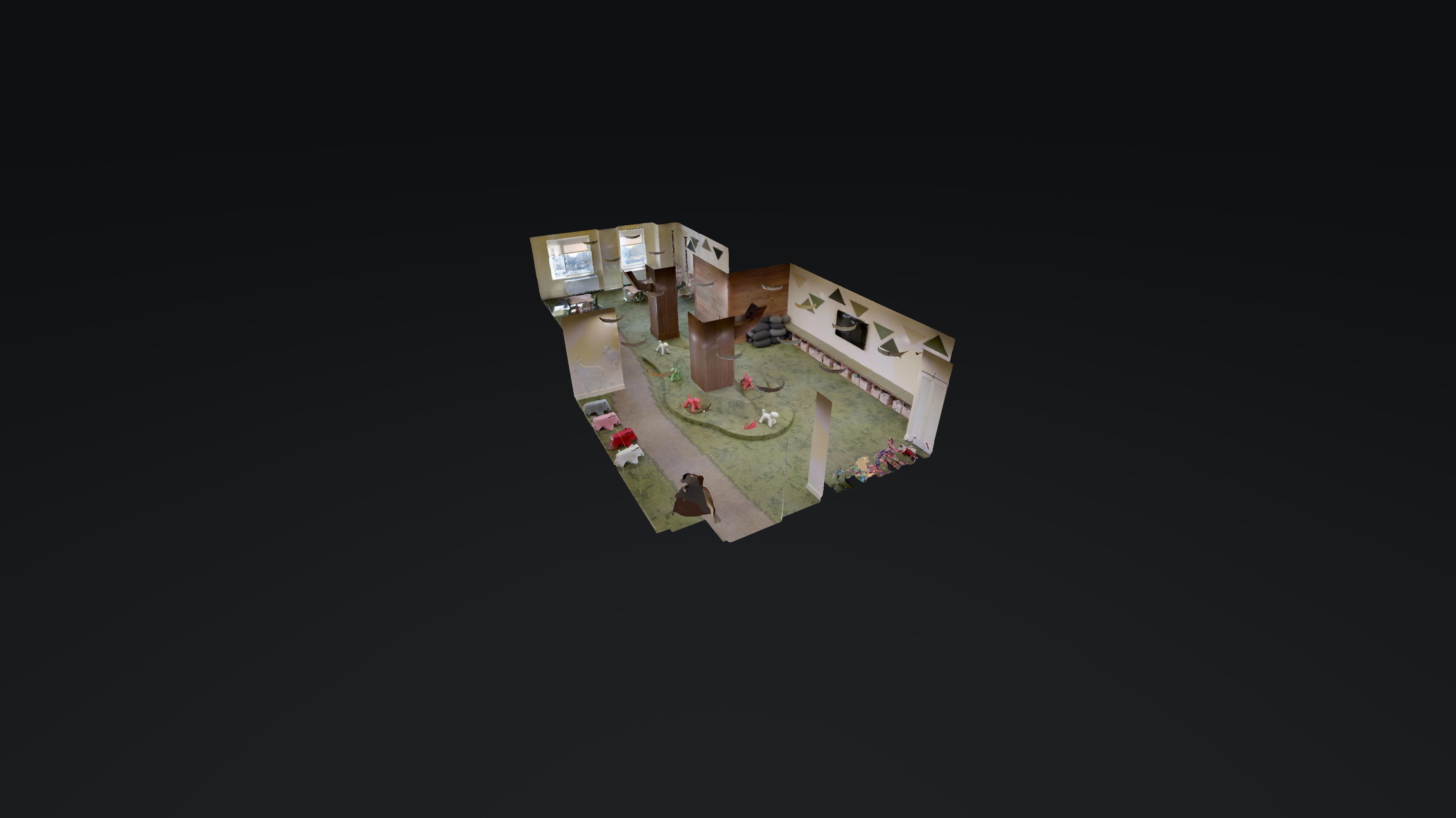 The image shows a 3D representation of a room with various furniture arrangements and green carpet.